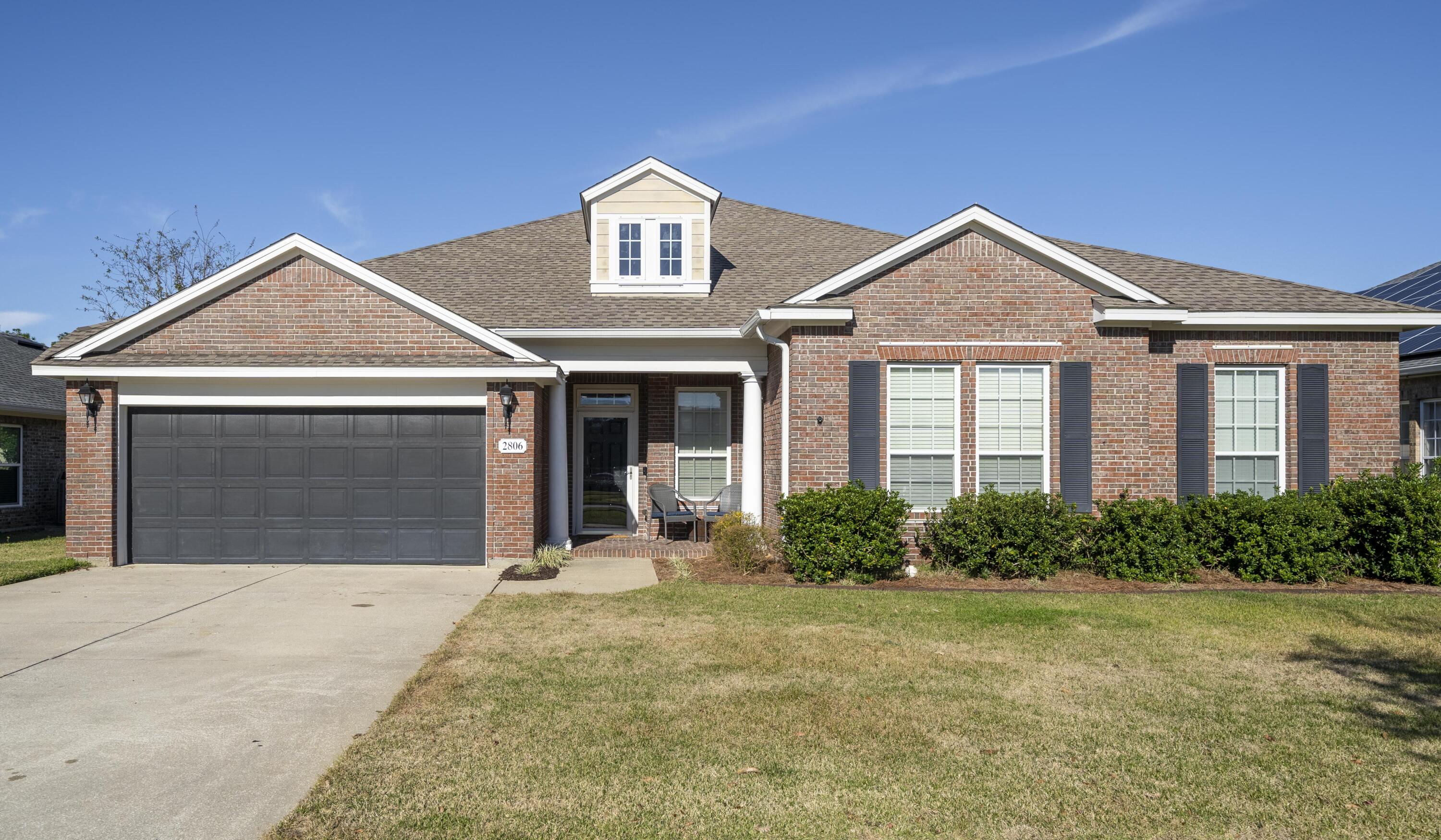 Located in the desirable Hawks Landing community, this 4-bedroom, 2.5-bath brick home offers nearly 2,600 square feet of comfortable living space with a layout designed for both everyday living and entertaining. Situated in the heart of Lynn Haven, it delivers the space, privacy, and lifestyle today's buyers are looking for. Inside, the spacious living area opens to the kitchen, creating an easy flow for gatherings and day-to-day life. The kitchen features ample cabinetry, generous counter space, and a large center island that anchors the heart of the home. The primary suite provides a relaxing retreat with double vanities, a soaking tub, and a separate tiled shower. Secondary bedrooms are well-sized and flexible for guests, kids, or a home office. Outdoor living is a standout feature with multiple spaces to enjoy, including a screened-in porch and a separate patio ideal for grilling. The privacy-fenced backyard includes a firepit, making it perfect for entertaining or unwinding at the end of the day. A major bonus is the fully paid-off solar panel system, keeping the average monthly power bill around $30 and offering incredible energy savings with no added cost to the new owner. Living in Lynn Haven means access to top schools, parks, shopping, dining, and nearby boat ramps, all while being just a short drive to Panama City Beach, Pier Park, and ECP Airport. Hawks Landing is known for its established feel, well-kept homes, and convenient location. This home delivers space, outdoor living, energy efficiency, and a location that makes Lynn Haven one of Bay County's most sought-after areas. Schedule your showing today