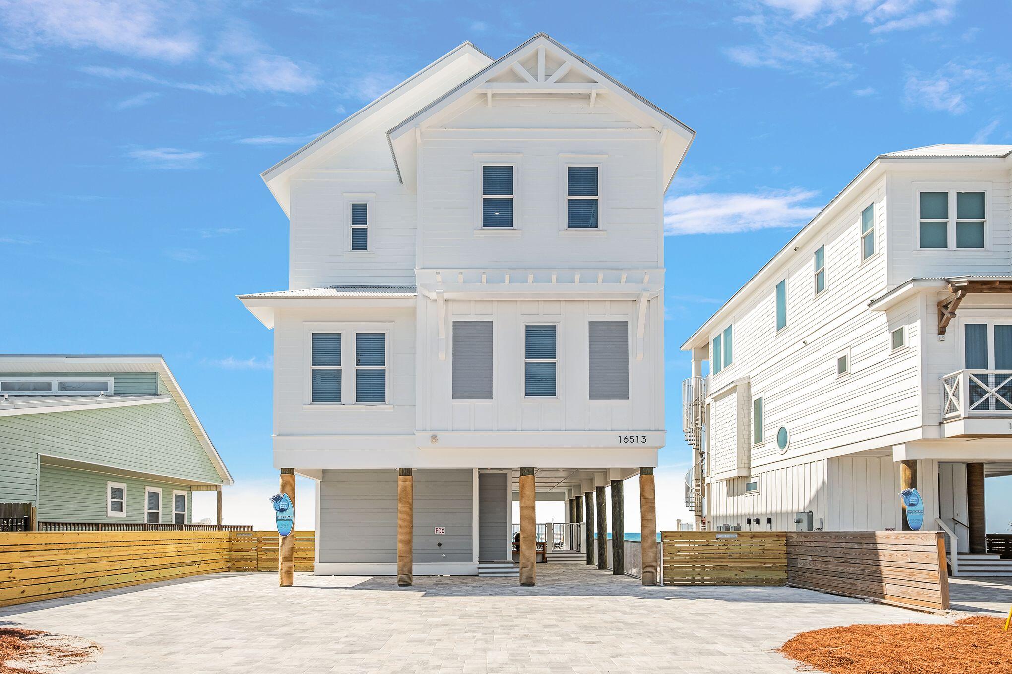 Brand New, just in time for the Season, Fully Furnished, Professionally Decorated and Already
Booked Solid with Holiday Beach Rentals.  This Beach House is within walking distance to Pier Park and just across the Street from Very Popular Dusty's Raw Bar.  The House sleeps 20 and is ready to go.  This Three Story, 6 Bedroom, 6 Full Bath home is built on a 50' x 124' Gulf Front lot with your own private Beach walkover, private pool and plenty of deck room on each floor.  The house features two master suites that are Gulf side.  ON RENTAL, SHOWING ON FLIP EACH SATURDAY