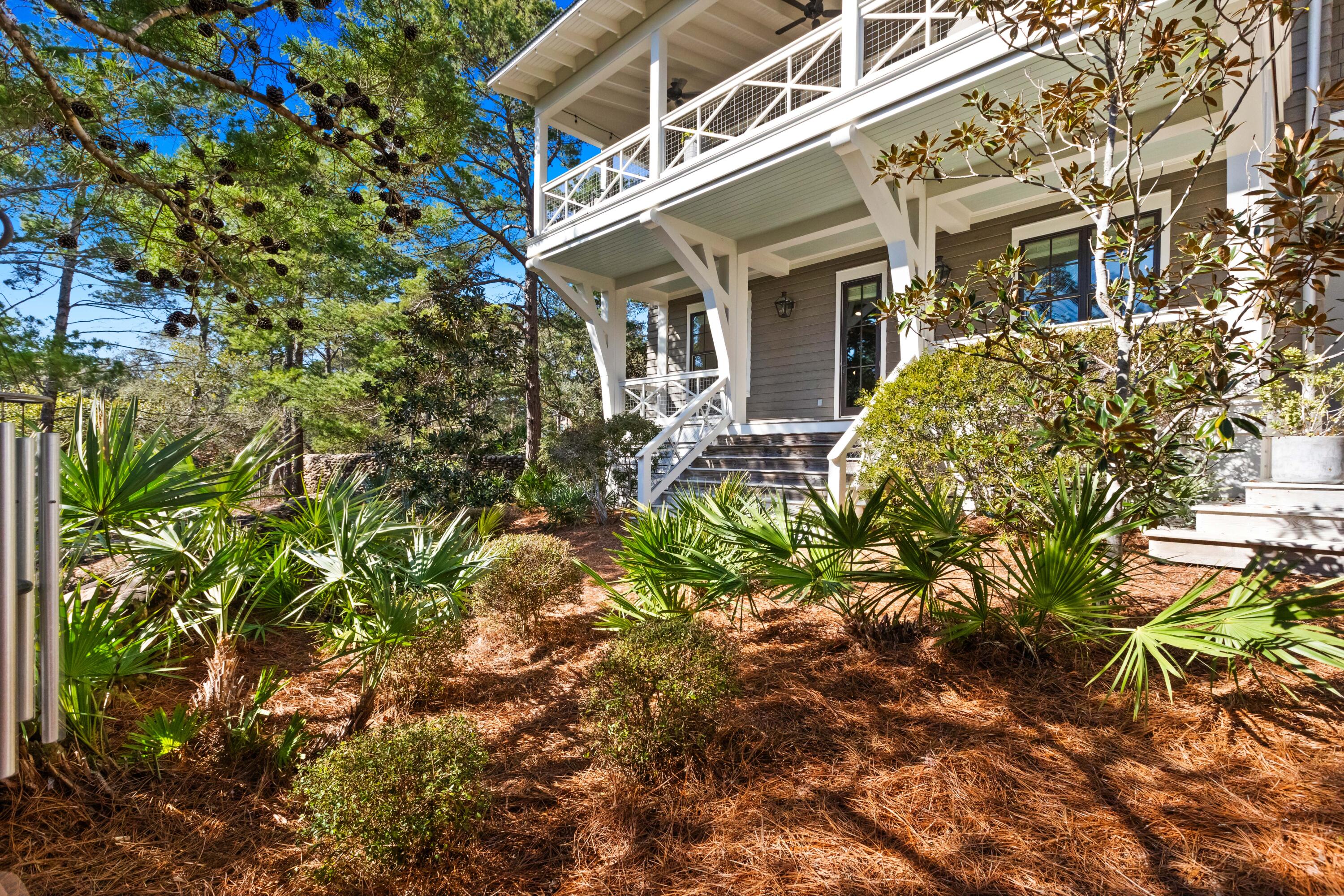 Nestled off of 30A in the picturesque neighborhood of Draper Lake, this thoughtfully designed home by Geoff Chick, with interiors curated by Erica Powell of Urban Grace Studios, offers a perfect blend of sophistication and comfort. Located on Dewberry, a quiet end-of-street enclave with just three neighbors, this home provides both privacy and charm.
Step inside the first floor to find two well-appointed bedrooms, each with en-suite baths. Between them, a charming bunk room features unique pecky cypress accents, adding warmth and character.
The second floor unfolds into a spacious, chef-designed kitchen that seamlessly connects to the open-concept living and dining areas, all framed by breathtaking lake views. Dine al fresco on the porch, or cozy up by the fireplace indoors-every detail has been meticulously crafted with custom finishes throughout.
The master suite offers a tranquil retreat, complete with a cozy nook leading into the bedroom, where serene lake views create a soothing ambiance.
In addition to the two car garage, there is a detached building, blending in with the architecture, for plenty of storage.
To experience this home is to truly appreciate its stunning natural surroundingsall while being in the heart of Blue Mountain Beach.