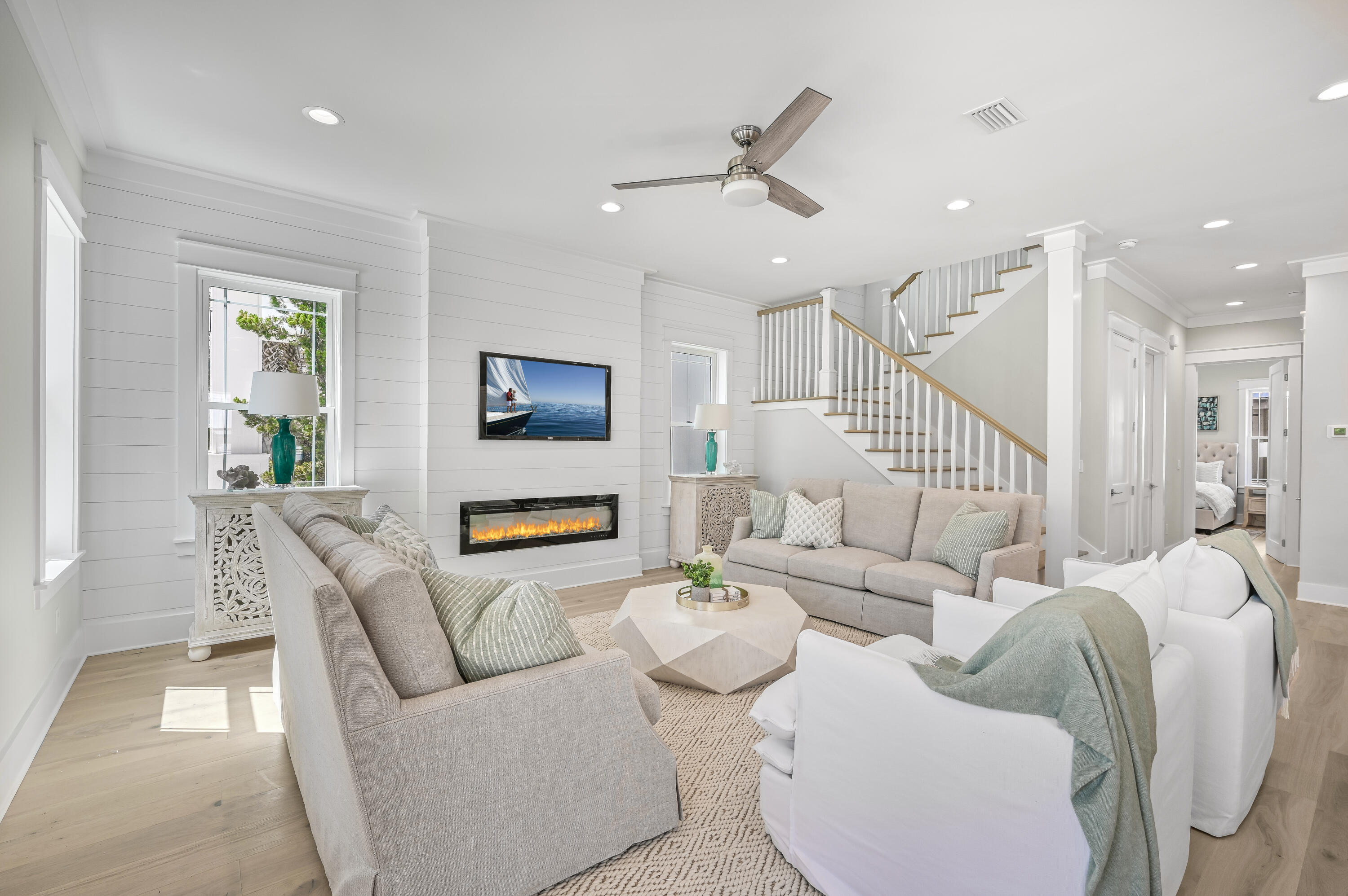 Brand new construction awaits in the coveted coastal community of Seacrest, ideally positioned between Alys and Rosemary Beaches along Scenic Highway 30A. Boasting nearly 3,000 square feet of living space, five bedrooms and four-and-a-half baths spread over two stories, this fully-furnished home is ideal for large groups or rental investment. Recently completed in 2023, this home offers high-end finishes, owner's suite on the first floor, two living areas and abundant natural light in an open-concept design. The second floor provides three bedrooms and a bunk room with access to a second-story porch ideal for relaxing after a day in the sun. This home offers convenient access to a large lagoon pool and beach access as well as tram service to the beach and close walk to restaurants and shops in 30A's most beloved communities.