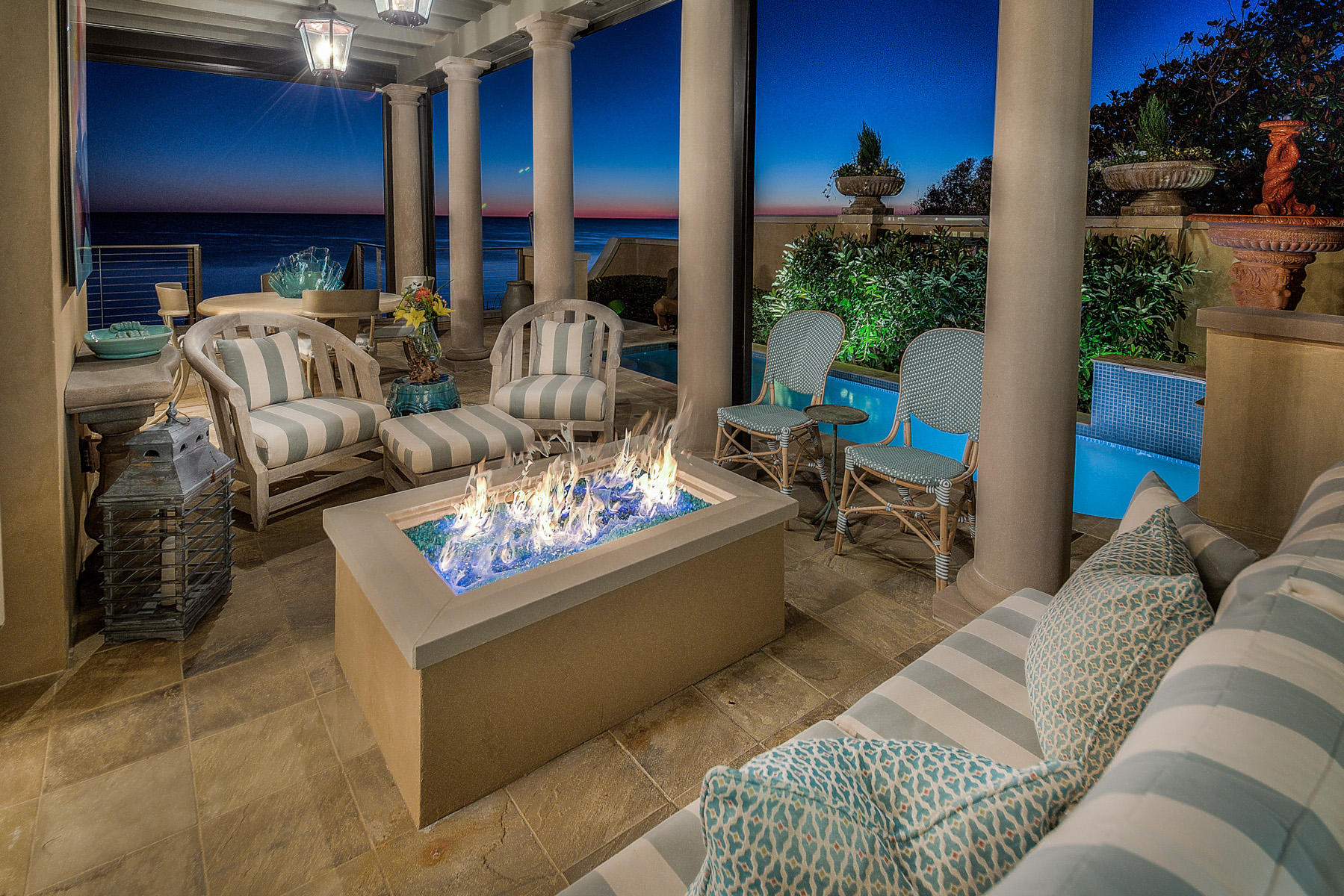 Step inside another world with this extraordinary oceanfront four bedroom, 4 -1/2 bath home that embodies the tempo of the neighborhood, The Retreat, with it's thoughtful design. Here is where extraordinary architecture, finishes, floorplan and quality meet while embracing the area's refined lifestyle. Located in the exclusive guard-gated community of The Retreat, this remarkable concrete constructed residence has dramatic gulf views, 70 feet of beach frontage with ample entertaining and leisure space replete with a pool, jacuzzi, outdoor fireplace, dining and living area.
At just over 6,000 square feet, the finishes of this exquisite home are justly alluring as is the architectural design of this home by McAlpine Tankersley Architects. The gracious main level is framed by a rounded ceiling layered in artisanal venetian plaster and flanked by tall, arched window and a commanding fireplace mantel and hearth.  The kitchen's vent hood mirrors the same precision in design as the fireplace.  The solid walnut kitchen island exudes the same artistry and overarching sense of standard.  

With inspiring panoramic views, the main level also features a walnut paneled study anchored by a fireplace and a lavish master bedroom suite with seating area, yet another fireplace, with dual walk-in closets, and master bathroom with a soaking tub and it's own private jacuzzi porch. With hardwood pine and stone flooring, Venetian plaster walls, and unprecedented custom features throughout, this exclusive property has authentic Old World style ambiance.  Including a stone-clad wine cellar, gym with steam shower, private swimming pool all accessible by an elevator.

It's not often that a property of such magnitude is available for purchase.  Situated south of Scenic Highway 30A, on the Gulf of Mexico and bordered by Draper Lake, which offers canoe launch and picnic pavilion.  Amenities at this exclusive address also include the private gulf facing Beach Club, with resort style pools, and access to 3,000 feet of private beach.
