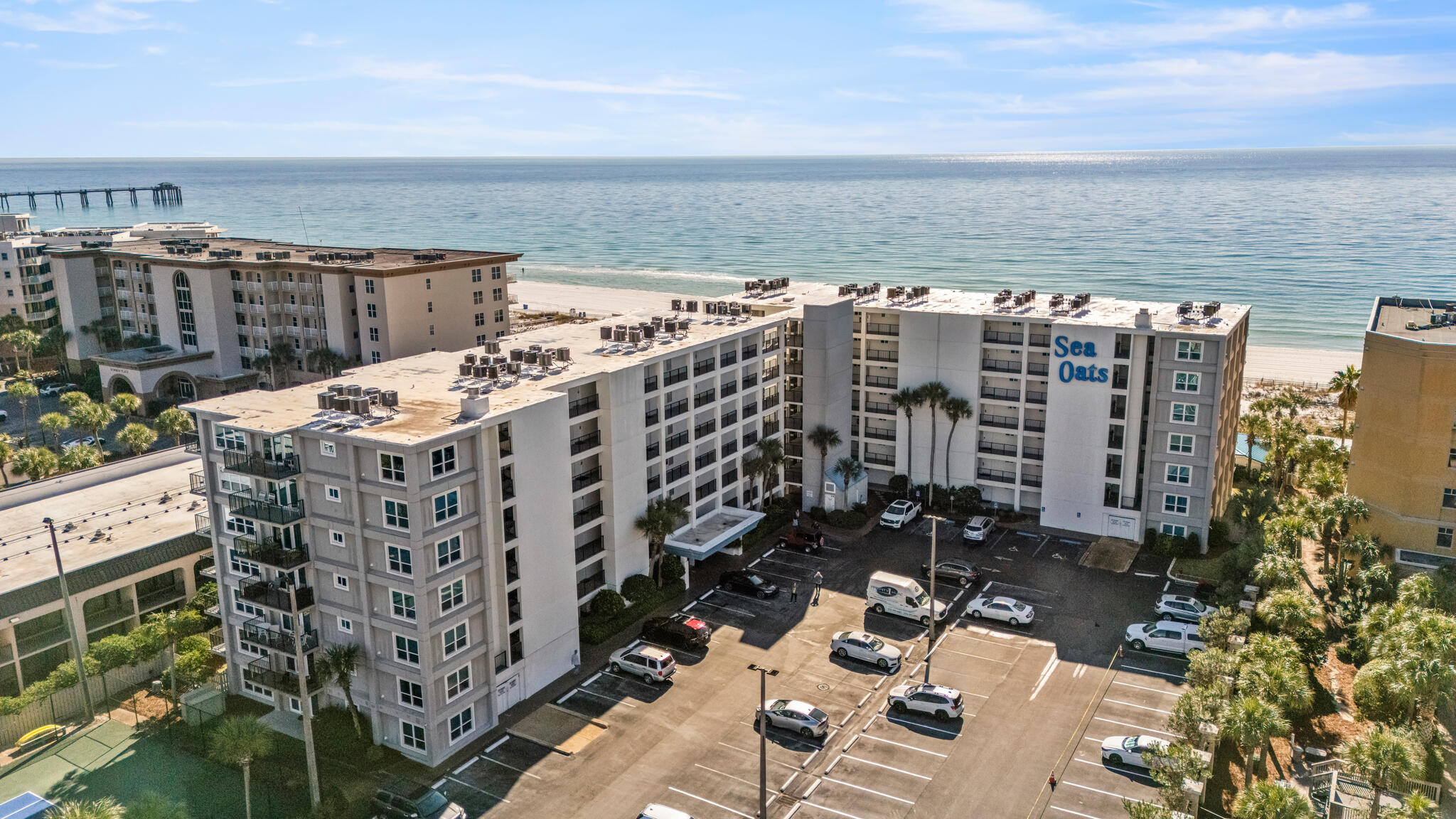 Experience coastal living on Okaloosa Island in Fort Walton Beach in this fully furnished, beautifully remodeled and updated 2 bedroom, 2 bathroom condo in the Gulf front Sea Oats Condominiums. Offering a heated community pool, hot tub, tennis courts, exercise room, private beach access, and more! Located just minutes from local Fort Walton Beach attractions such as the Okaloosa Island Pier, Gulfarium, and tons of shopping, dining and entertainment spots! Located on the 3rd floor, this entire unit has been updated and is move-in-ready. The kitchen features upgraded shaker-style cabinets and beautiful granite countertops - with a breakfast bar looking out into the dining and living areas, and your very own private balcony! Just off the living room is the primary suite with newly remodeled ensuite - featuring a gorgeous, cultured marble walk-in shower. Perfect for a spa-like retreat after a day on the beach! Both bathrooms have also been upgraded with matching granite countertops and new cabinetry. Whether you're looking for a new primary residence or investment property - this is a fantastic opportunity to own a little piece of paradise!