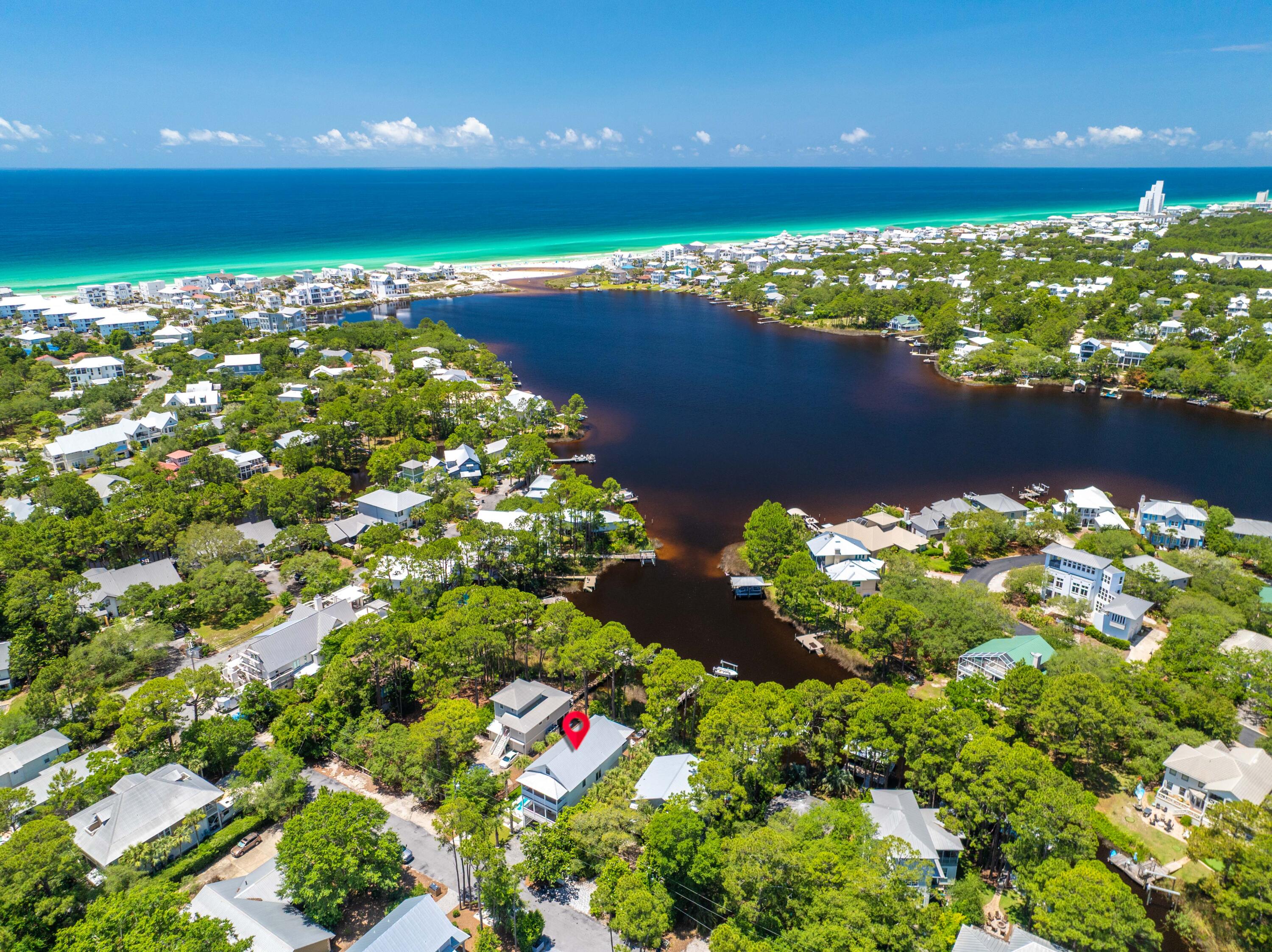 Stunning Lakefront Home on 30A - 59 Trae Lane

This exquisite 4-bed, 4.5-bath lakefront home on Eastern Lake offers luxury and prime location. Built in 2019 as a second home and never rented. It features an open-concept design, a gourmet kitchen, and en-suite baths for every bedroom. Enjoy breathtaking views from the private heated pool and spacious deck. A private boat dock (17ft 1995 cape horn center console included) provides direct lake access, allowing you to boat or paddle board to the beach and walk to the Gulf. Nestled on a quiet street yet minutes from 30A's best dining and shopping, this home is a rare gem in Seagrove Beach!  Upon entering, you'll be captivated by the open-concept design that seamlessly blends indoor and outdoor living. The gourmet kitchen, equipped with high-end appliances and a large island, flows effortlessly into the inviting living area, creating an ideal space for entertaining. Each bedroom is thoughtfully designed, featuring en-suite bathrooms for ultimate privacy and comfort.

Step outside to your private oasis. The heated pool invites year-round relaxation, while the expansive deck offers breathtaking views of Eastern Lake. The property's private boat dock provides direct access to the lake, allowing you to navigate effortlessly to the beach and enjoy a leisurely walk to the Gulf of Mexico's pristine white sands and emerald waters.

Located on a tranquil street, this home is just moments away from Seagrove Beach's vibrant dining and shopping destinations. Enjoy local favorites like Old Florida Fish House, Beach Bean Coffee, Buddy's Seafood Market, and Coast Creamery, all within walking distance.

Experience the perfect blend of luxury and coastal living at 59 Trae Lanea true gem in the coveted 30A community.