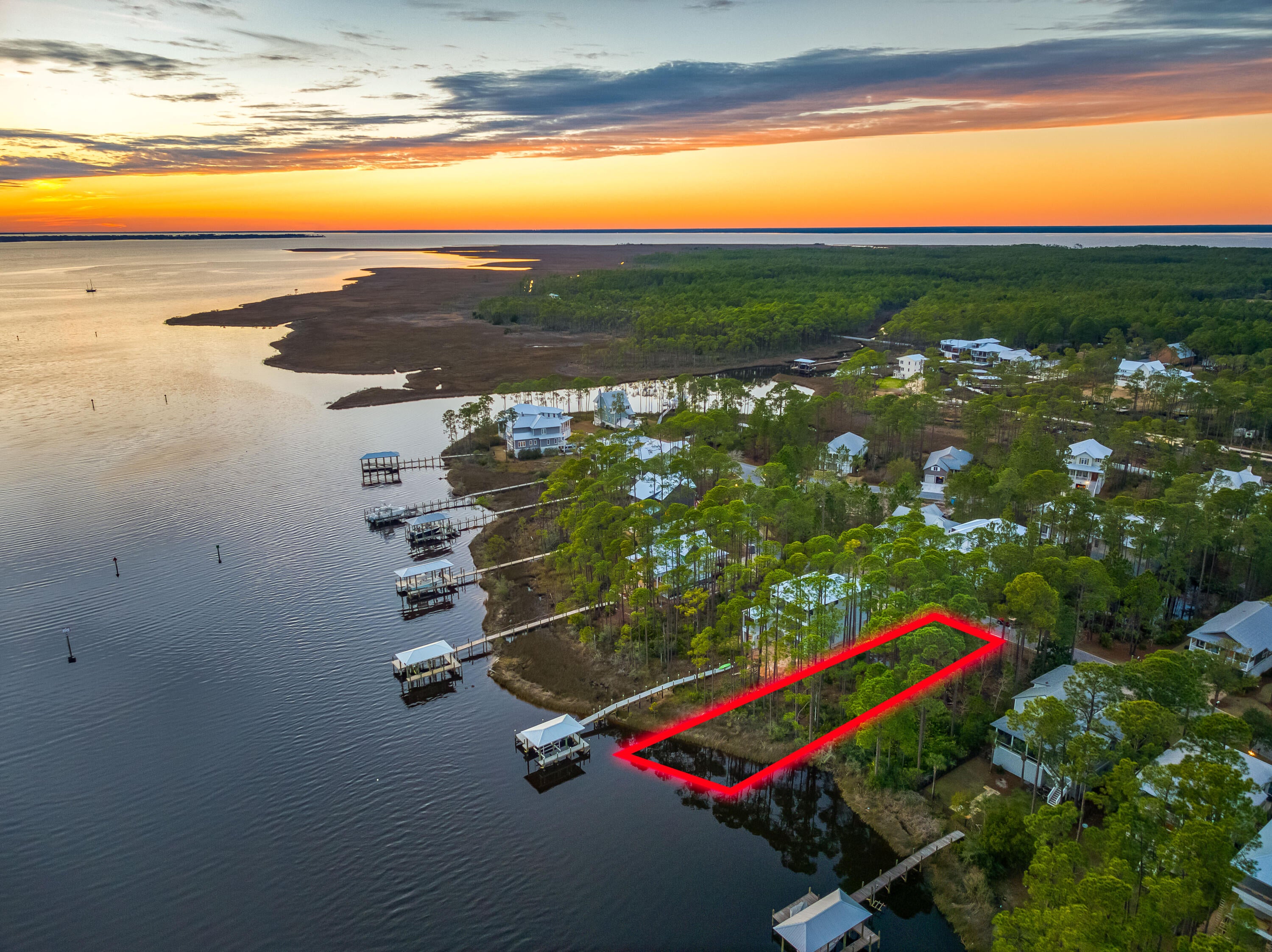 Welcome HOME to Cessna Landing, one of Santa Rosa Beach's few private bay front communities. Sitting at over a quarter-acre, this waterfront lot is perfectly situated to offer stunning sunrise + sunset views and for building your dream home in South Walton! From the 66ft of private bay frontage on deep water ( 4-5 ft), a future dock will allow for up to two boats and paddle board/kayak access. Chowtawhatchee Bay is home to excellent fishing, exploring, watersports, and access to Destin, the Gulf of Mexico, and Panama City Beach. Cessna Landing is a gated, private community offering just 50 total homesites. Lot W-16 Mallard Lane is conveniently just north from multiple 30A beach accesses, 30A fun, local restaurants. grocery stories, Sacred Heart hospital, and top South Walton schools.