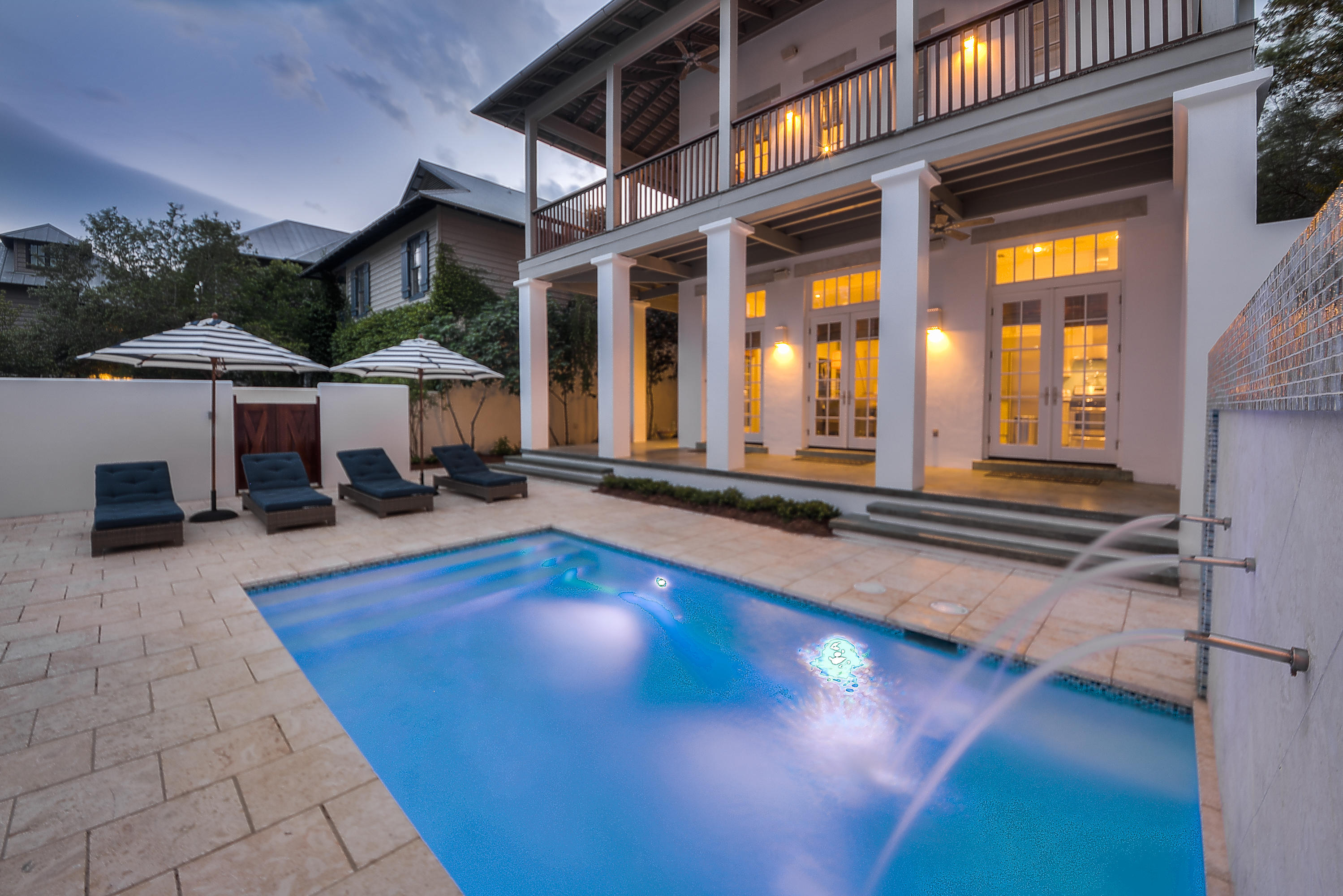 The waiting is over, as this beautiful all concrete main home & carriage house have under-gone a major interior transformation Inclusive of new flooring and new home furnishings throughout. This home is Turn-key and ready for your immediate use and family enjoyment. Located south of Scenic Hwy 30-A on a large Rosemary Beach lot this home provides a full array of amenities and features. Entering from the boardwalk through a most magnificent mahogany door, leads one to the covered verandas and a beautiful Courtyard with private Pool inclusive of a Water Feature and a Summer Kitchen for fabulous outdoor grilling. The interior of the main home feature shiplap on all 3 levels, Brazilian Cherry Hardwood floors throughout with beautiful lighting, a stunning fireplace and 4 bedrooms + bonus area. The Carriage House entry level has an open dining-living area, galley kitchen, a 2 Bunk-room and half bath. Then it's up the wrap-around staircase to the Loft Bedroom and Full Bath. Much is offered in this "very Rosemary" styled home. Come see it for yourself.      
Information contained within this listing such as square footage, is deemed to be accurate but is not guaranteed. Buyer to verify.
