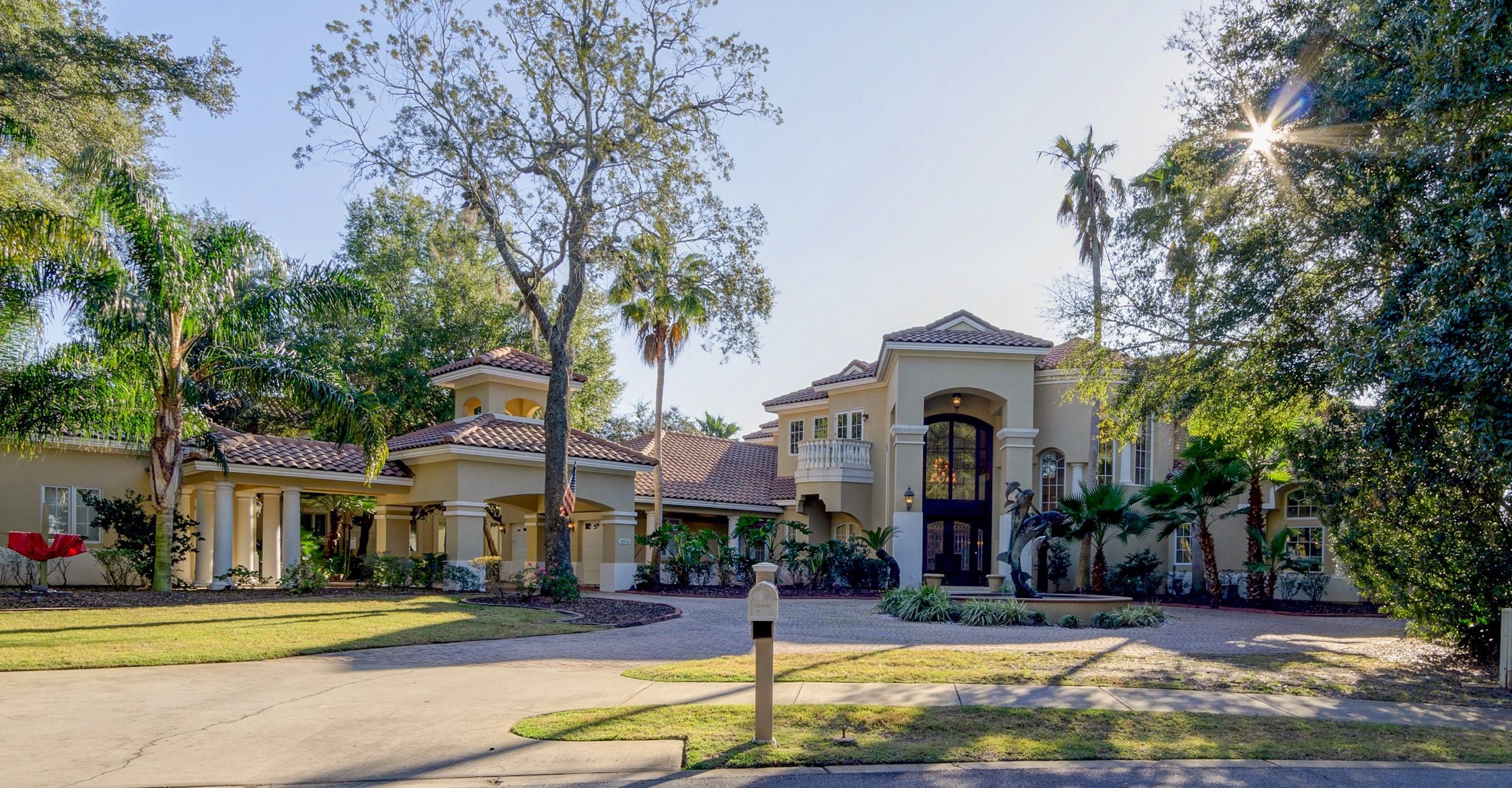 $300,000 PRICE REDUCTION!! MOTIVATED SELLER!! Bring your offers, and take advantage of this rare opportunity!! Luxury and elegance in this magnificent waterfront estate that is built for a lifestyle full of entertaining and outdoor watersports for those who love to be on the water! Set on the protected deep-water of Indian Bayou on the Choctawhatchee Bay, in Destin's gated, master-planned golf community of Kelly Plantation, the award-winning home presents the perfect backdrop for those who relish waterside living and deep-water boating in Florida style! The deep-water dock is a yacht-lover's dream, with room to dock a large boat plus additional watercraft, multiple lifts, ports for jet skis, fish cleaning station, and easy access to the bay and the Gulf of Mexico. The largest slip of the 3 deep-water mooring areas measures 17' in width, providing 7.5' in water depth.  New Trex decking has been installed on the dock.  $630,000.00 BELOW RECENT APPRAISAL!! 

Timelessly sophisticated interiors are intensified when you open the doors to a grand foyer with gleaming marble floors, large granite-topped bar, and curving staircase with custom iron railings. The inviting view of the beautiful, fully screened patio and pool and the sparkling waters of the bay draws the eye, as does the 400-gallon aquarium that separates the formal living and dining rooms. This estate was built by Bill Johnson and designed by the Evans Group, a nationally acclaimed firm, the spaces and details showcase your decor, while the floorplan flows effortlessly from one living space into the next. In the gourmet kitchen, top-of-the-line appliances blend with custom cabinetry, including a Subzero refrigerator, four refrigerator drawers, double oven, warming drawers, two dishwashers, ice machine, professional Thermador cooktop, and more. Watch the sunset from your private enclosed patio and grill your day's catch in the recently renovated summer kitchen, which includes an Alfresco grill, refrigerated drawers, icemaker, and sink.

Past the double doors of the study lies the amazing master wing. With a morning kitchen, sitting/exercise/spa room, incredible closet, and marble-framed gas fireplace in the bedroom, and a huge, luxurious bathroom, you could spend all day in your private retreat! Up the stairs--or the elevator--the large balcony/loft with another bar/mini-kitchen makes a perfect game and media room. Two additional master suites at the ends of the second floor offer privacy and comfort. Each suite enjoys its own private outdoor deck, plus access to the balcony, all within the screened patio. Kids will love the two additional bedrooms, currently with tropical island and mermaid themes. 

Made for indoor/outdoor living, the two-story screened lanai, which has recently been enlarged, encloses your own oasis! It features a pool, spa, rockery waterfall, lush landscaping, and a view of the bayou. The main patio has abundant room for family and friends to gather round the pool. More separated areas provide quieter spots for sunning, dining, or relaxing under the stars. 

The estate features both an attached and detached garage, with room for up to five vehicles. Additional conveniences include a new Creston system for audio/video, security, etc., touch lighting in all rooms, instant hot water, two laundry rooms, three A/C units, natural gas generator, abundant storage, and much more. The amenities of Kelly Plantation, including golf, are just down the road, as are Destin's fabulous white sand beaches and numerous dining and entertainment venues. Come see in person why this is the perfect place to live your perfect life!