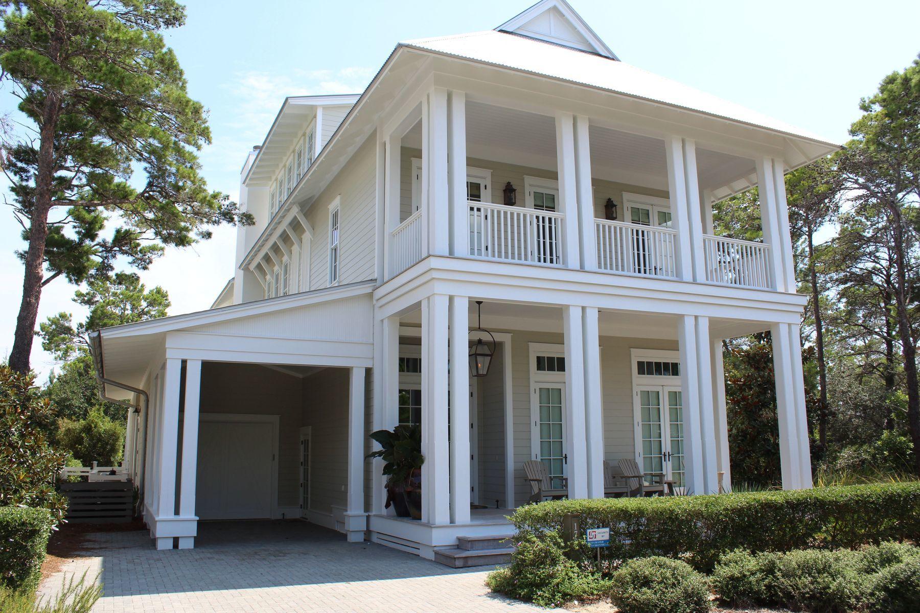 Fresh from the pages of the prestigious ''Cottage Style'' magazine, this three-story Florida cottage combines Cara McBroom design from Lovelace Interiors with an enviable WaterColor lifestyle.
From the moment you step inside you are ushered through the house by the beautiful Oak floors so you can throw open the triple sets of French doors leading to the pool and listen, you know this is where you belong. There's nothing to disturb the peace and tranquility apart from the sound of happy birdsong and the breeze in the pine trees.
The immaculate interior features classic timeless dcor including shiplap throughout, tying the home to its natural surroundings. The gourmet kitchen will thrill gourmands with its white marble counter-tops, high-end appliances, built-in coffee and latte maker, wine cooler and ice maker which make entertaining a pleasure. It connects with the open living space so you can relax in front of the fireplace with your favorite music emanating softly through the SONOS sound system.  The Oak Wood flooring and featured beamed ceiling flow seamlessly into the open dining area for enjoying a meal in relaxed style.  

Backing onto protected native greenery, the private covered deck transitions to an outdoor kitchen and fireplace for lazy barbecues at any time of year. Additional and private peaceful outdoor space can be found on the front porch and second floor decks; one off the master and the other off the second-floor private study area. The third floor, with its treetop vistas, features a bunk room, media room and den/flex room.  

WaterColor Beach amenities outshine the rest with an award-winning Beach Club undergoing a $15M renovation that is almost complete with two new restaurants and two additional pools, including one with a "zero" entry for easy access.  The newly completed Camp WaterColor includes a Lazy River and water slide  perfect for youngsters of all ages! Wooded trails and green parks can be explored by hiking or bicycle and the fully stocked boathouse provides access for kayaking, paddle boarding and fishing on Western Lake. It's all part of the WaterColor lifestyle.