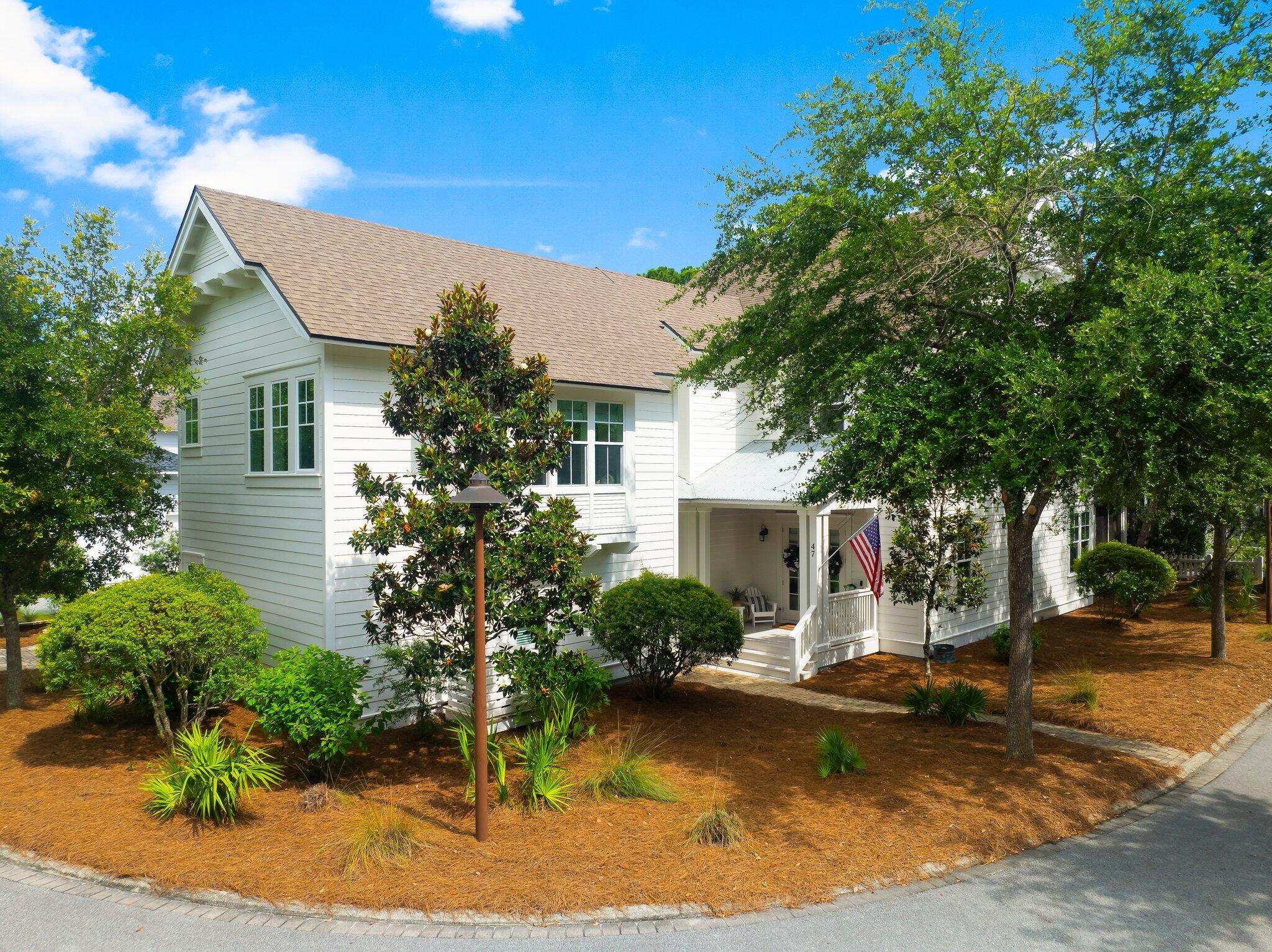 Nestled within a serene, wooded enclave in the sought-after Watersound West Beach community, this exquisite 5-bedroom, 5.5-bathroom residence is situated on an oversized corner lot, offering unparalleled privacy and tranquility. The main part of the home showcases a luxurious first-floor primary bedroom with en-suite bath, alongside a gourmet kitchen and inviting living and dining areas, designed for both comfort and sophistication. The second-floor features three additional bedrooms each with en-suite baths, providing ample space for family and guests. A double bunk niche and a versatile family/bonus room further enhance the appeal of this coastal retreat.  Additionally, this home features a separate carriage house with fully equipped kitchen, living room, and private bedroom and bath. This distinctive feature provides a private and comfortable space for guests or can serve as an ideal retreat for extended family members. The home also features a spacious screened porch that leads to a brick paver patio providing a seamless transition between indoor and outdoor living spaces, perfect for enjoying the coastal breeze and natural surroundings.   Furthermore, the property offers the opportunity to add an inground pool, providing a luxurious and private outdoor oasis to complement the coastal lifestyle.

Residents of Watersound West Beach enjoy access to a range of exclusive community amenities, including a heated and cooled community pool, a golf puttering park, fitness center and your own private, dedicated beach. 

With an abundance of space and an emphasis on refined living, this home seamlessly blends elegance with coastal charm, making it an idyllic retreat for those seeking an unparalleled lifestyle.