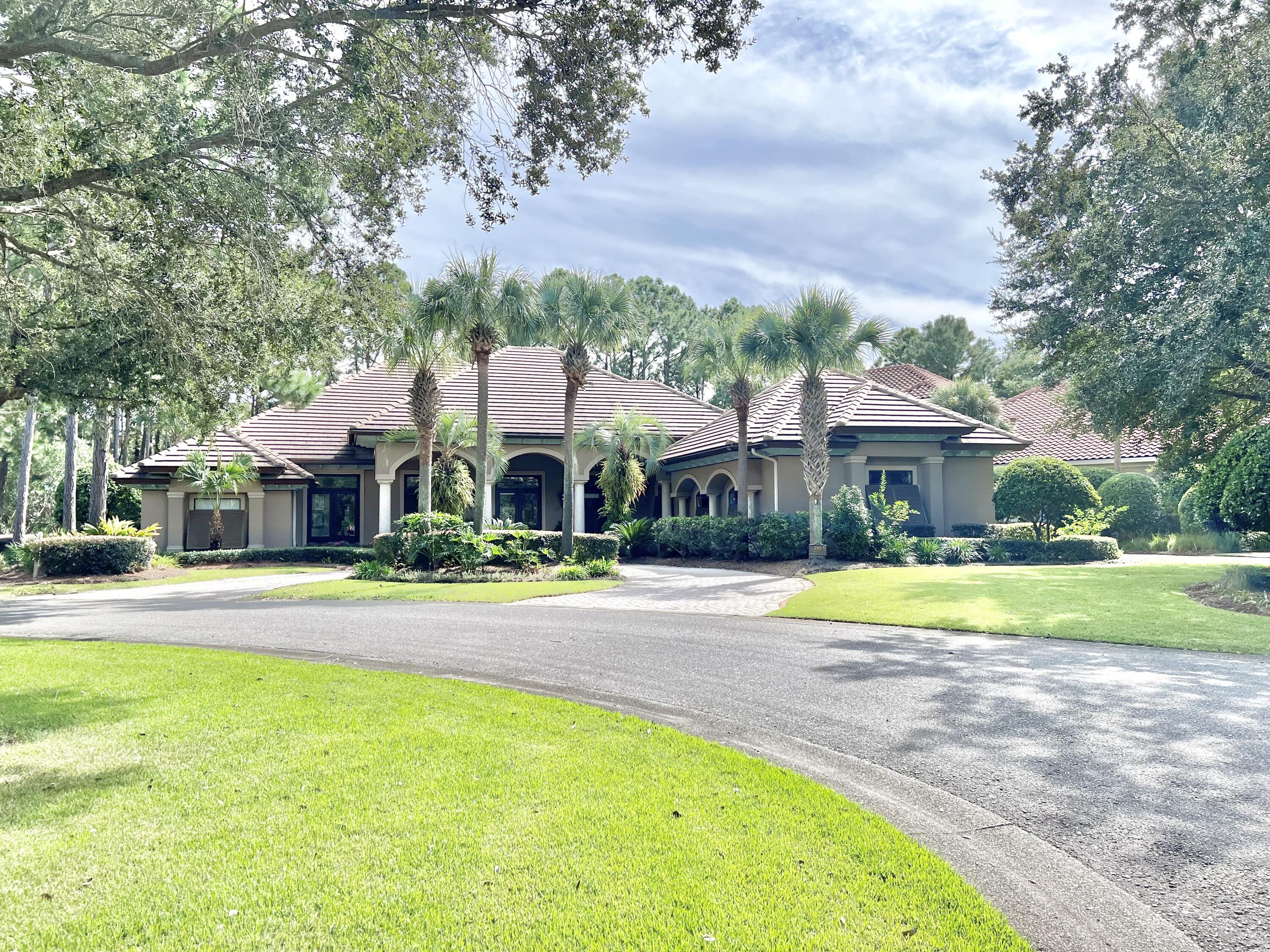 THIS CARIBBEAN STYLE 1-STORY HOME SITS BEHIND THE GATES IN THE MOST PRESTIGIOUS NEIGHBORHOOD ON THE RESORT. A CUSTOM HOME W/3 BR/3 BATHS PLUS A STUDY ON OVER 1/2AC, LOCATED ON THE 14TH HOLE OF THE RAVEN WHICH AFFORDS PRIVACY AND SERENITY! YOU'LL BE GREETED BY THE OVERSIZED PORCH WITH CARIBBEAN BLUE CEILING, BAHAMA SHUTTERS, GAS LANTERNS, & BEAUTIFUL MAHOGANY DOORS. NEW TRAVERTINE FLOORS & IMPECCABLE FURNISHINGS ADD TO IT'S BEAUTY! COLONIAL WEST INDIES INSPIRED DESIGN W/3 FIREPLACES & HUGE OPEN LIVING SPACES. MOST OF THE HOME HAS 12 FT CEILINGS AND 8 FT DOORS.  A COMPLETE OUTDOOR KITCHEN W/LIVING & DINING AREA W/STACKED STONE GAS FIREPLACE & TV OVER CEDAR MANTLE. NEW POOL ENCLOSURE OVER THE ENTIRE OUTDOOR LIVING AREA! CHEF'S KITCHEN IS SURE TO DELIGHT