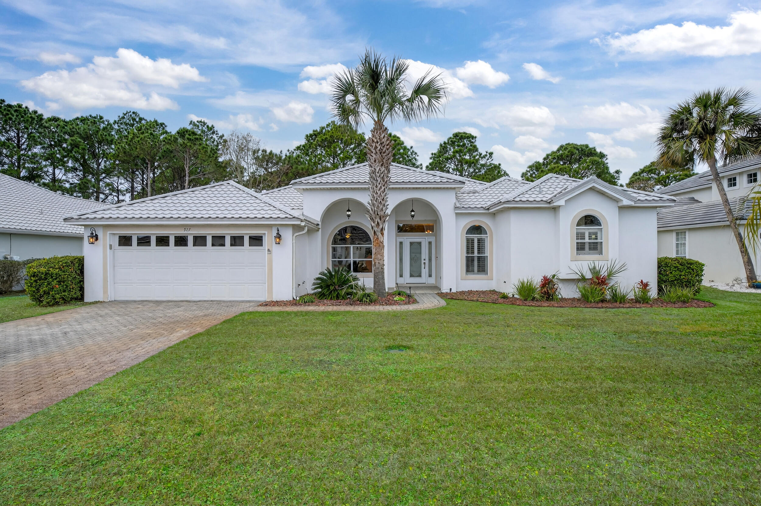 PRICE REDUCED with NEW FLOORING TOO! Located in Destin's highly desirable Emerald Bay Golf Community, this warm & lifestyle driven 3-bedroom, 2-bath home with separate office offers comfortable coastal living in a prime Destin location. The popular split-bedroom floor plan provides privacy & functionality for everyday living & hosting guests. Inside, you'll find plantation shutters, newer Samsung appliances & lots of cabinet space with granite in the kitchen. One of the home's standout features is the 377 square foot heated/cooled sunroom which perfect for year-round enjoyment & makes the square footage total 2,539.....ideal for relaxing, entertaining or use as additional living space. Did we mention BRAND NEW ROOF.... brand new metal roof adds long-term value. Situated in a golf community on the bay, residents enjoy a scenic setting with convenient access to Destin's beaches, dining, shopping, and entertainment. This home offers an excellent blend of comfort, durability, and location! Low HOA fee....$254/quarter and in X Flood Zone!