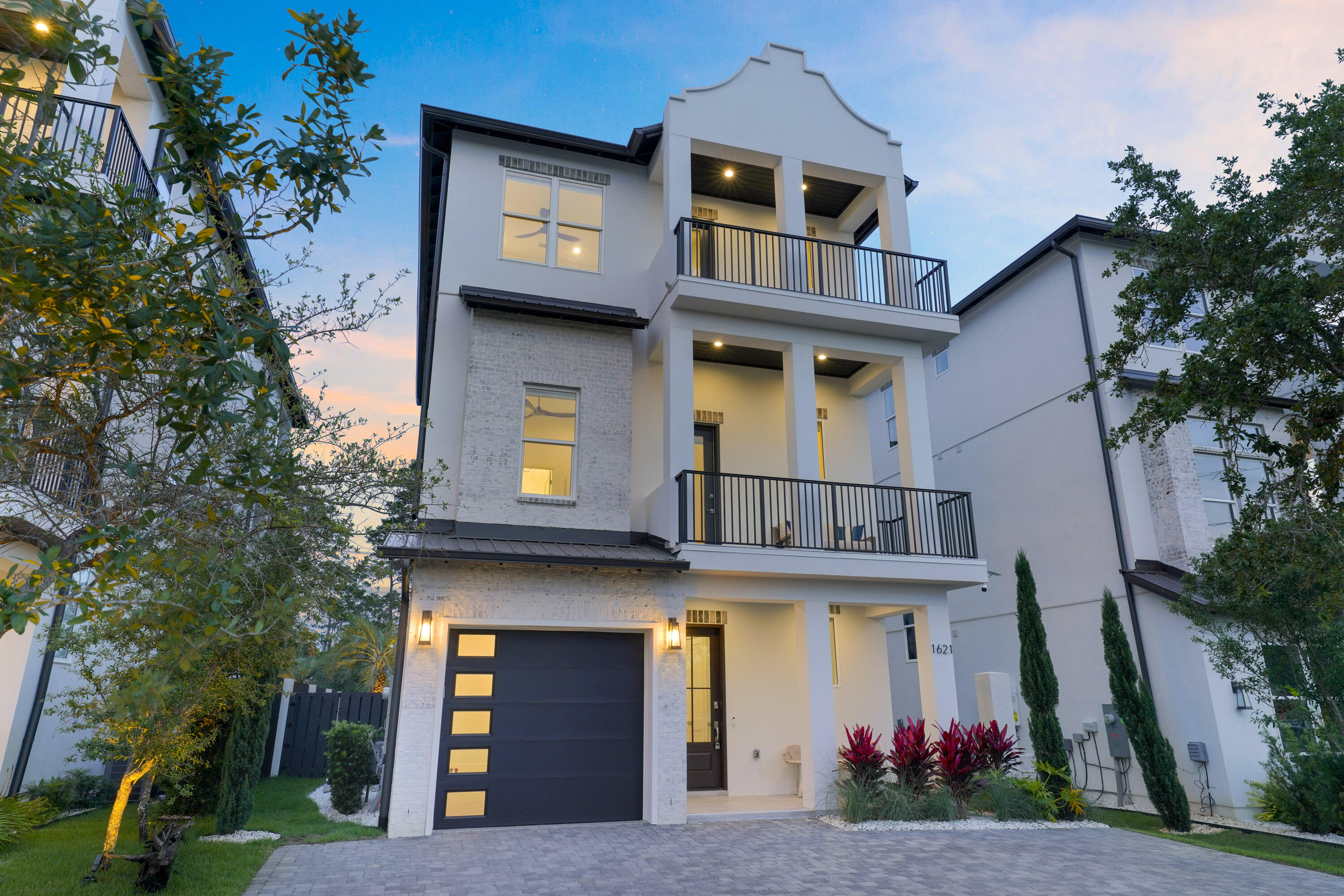 This extraordinary NEW Construction home is a lavish sanctuary mere steps from dining, shopping,and the beautiful white sand beaches. This opulent coastal masterpiece. It has 5 bedrooms and 6.5 bathrooms w/master en-suite bath that has stand alone tub and walk in shower and custom tile through out. Upon entering the home you will fall in love with the open concept living areas that merge with multiple outdoor porches which offer Gulf views from elevated vantage points. First floor game room which opens to the pool area for extra indoor/outdoor feel. 2 Bunk Rooms and  Bunk niche, 10 total bunks. Each floor has washer/dryer, wet bar, microwave drawer and small fridge.The kitchen/ dining area has a massive island that seats 14 and gorgeous lighting from Restoration hardware.