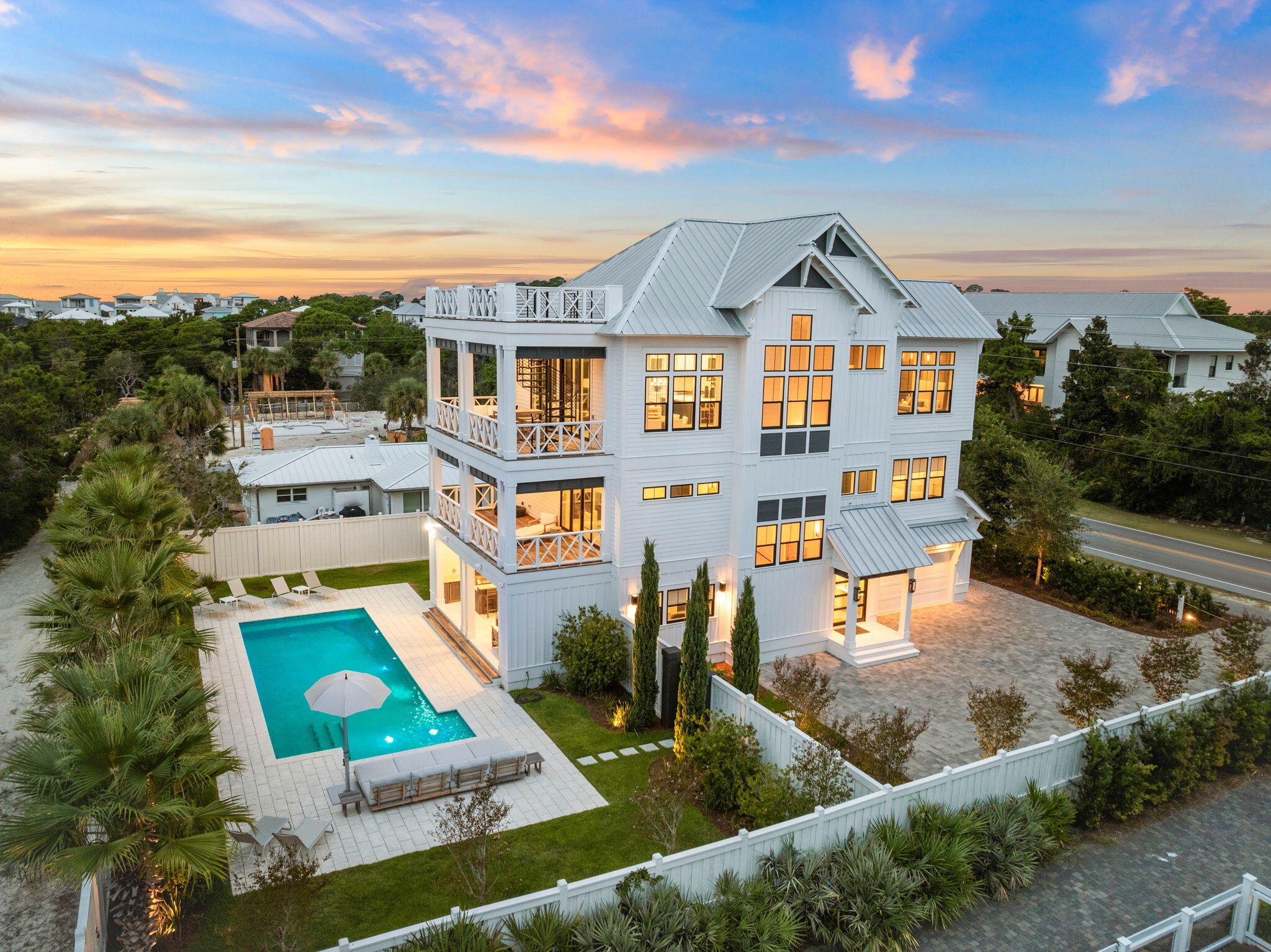 Experience unparalleled coastal living in this stunning estate, perfectly positioned on the serene west end of 30A. Situated on a spacious double lot measuring 100 x 133 feet, this exquisite property is a masterpiece of design and craftsmanship, built by the renowned Cogent Building Group. Featuring expansive living spaces and breathtaking views, this home redefines luxury living on 30A. Step inside to discover a seamless blend of modern luxury and coastal charm, where natural light floods every corner, highlighting the exquisite finishes and thoughtful details throughout. The open-concept living and dining areas are ideal for entertaining, centered around a striking floor-to-ceiling fireplace that adds warmth and elegance to the space. The gourmet kitchen is a chef's dream, equipped with top-of-the-line Sub-Zero appliances, a 60" Wolf stove, sleek cabinetry, and a generous 8' x 11' honed white Carrara marble island that invites family and friends to gather and create memories.

The luxurious primary suite is a private sanctuary with beautiful views, a spa-like ensuite bathroom, and a walk-in closet designed to accommodate a discerning wardrobe. Additional guest suites offer comfort and privacy, each thoughtfully designed with high-end finishes and serene views.

Outdoors, your personal paradise awaits with a resort-style pool measuring 16' x 43', offering the ultimate spot for relaxation or entertaining. The expansive deck area, complete with a bar, outdoor kitchen featuring a Twin Eagles flat-top grill, and multiple lounging areas, is perfect for soaking up the sun, hosting gatherings, or simply enjoying the tranquil surroundings.

With its impeccable design, generous dimensions, and unparalleled location, this home on 30A is more than a residenceit's a lifestyle. Embrace the ultimate in coastal living and make this exceptional property your own.

Reach out to use today for rental projections & cost to own figures.