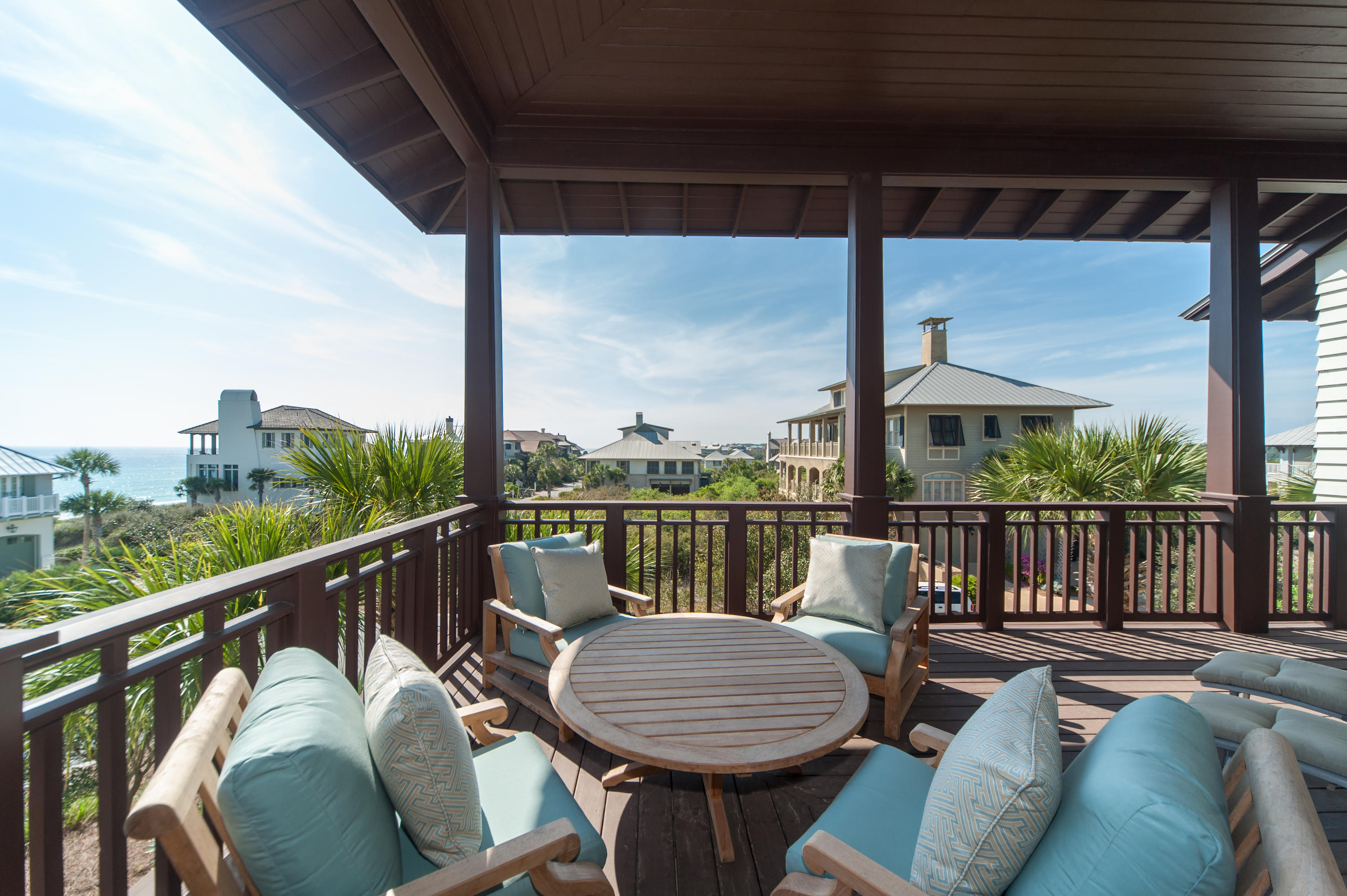 One row back from the Gulf, the exclusive residence of 38 St. Lucia Lane is elevated on one of the most desired homesites within The Retreat. Sitting high atop the dunes on the Emerald Coast rim, you'll find a custom-built treasure standing proud among the Gulf breezes. Precise attention to design and construction detail has been given by acclaimed architect Tom Christ and builder Breaux Construction in creating one of the finest residences in South Walton's scenic paradise. A retreat for the ages, with 3 luxurious levels encompassing 5 bedrooms and 5 baths, plus a bunk room on the 3rd level, which would also make a great studio, office, or play room. The home boasts an old-world style of comfortable elegance and spaciousness with 5,000 square feet plus 1,800 square feet of deep, porches. The desirable elevation on this corner site lends Gulf views from all three levels. Solid concrete construction, its solidity is enhanced by warm, antique heart of pine flooring restored from a 100 year old barn. Each bedroom on the first floor offers its own exterior enclosed shower, directly connected to each bathroom. A sight to see is the custom commercial kitchen, built to satisfy even the most demanding gourmets, with custom cabinetry, 2 dishwashers, prep sink, a custom warming shelf above the stove, stainless appliances, and granite counters. Expansive views of the Gulf can be captured from the second floor living and dining room and from the third floor game room. Enjoy a sunset soak nestled privately on your daybed swing of the expansive front deck on the first floor. This home combines rustic elegance with old world charm in an exclusive and private beach setting found only in The Retreat.
