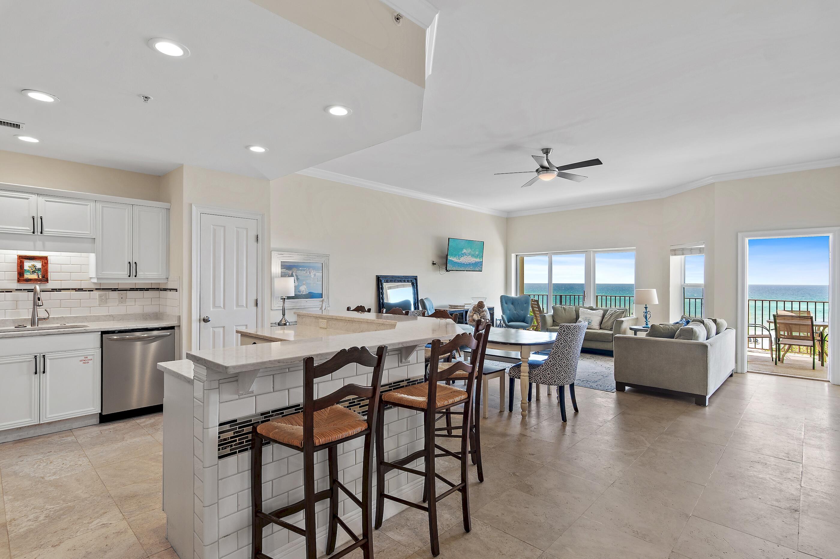 Exquisite Gulf-Front Living at Its Finest
Welcome to 3880 E. Co. Highway 30A, Unit 202—a rare opportunity to own an exceptional residence in one of the most coveted stretches of Florida's iconic Scenic Highway 30A. Nestled in the heart of Seagrove Beach in the gated community The Legacy, this impeccably appointed 4-bedroom, 3-bathroom condominium blends timeless elegance with coastal sophistication, offering a seamless fusion of comfort, style, and breathtaking Gulf-front views.
From the moment you enter, you're greeted by a bright tile foyer, which leads to two spacious bedrooms with updated LVP flooring, which share a tiled bathroom. The first bedroom features a queen bed, and the adjoining bedroom has two double bunkbeds. The third bedroom features LVP flooring and shares access to another bathroom. As you move towards the kitchen and living room, you experience an open-concept living space framed by large windows that invite in the natural light and stunning emerald waters of the Gulf of America. The spacious private balcony becomes an extension of your living space  - perfect for morning coffee, sunset toasts, and uninterrupted relaxation with the sound of the surf as your backdrop along with the sugar white sand of the emerald coast.
The gourmet kitchen is a chef's dream, featuring custom cabinetry, premium stainless steel appliances, granite countertops, and a large island with six bar stools perfect for entertaining. The living room is very spacious and has access to the private balcony. The primary suite is a luxurious retreat with tile flooring, a king size bed, Gulf views, direct balcony access, and a spa-inspired ensuite bath boasting dual vanities, a soaking tub, and a separate glass-enclosed double shower.
Thoughtful design details include high ceilings, crown molding, and upscale finishes throughout, along with private storage and deeded beach access. This exclusive residence is part of a boutique, low-density building offering elevated privacy, secured entry, and a beachfront pool for ultimate convenience and relaxation.
Located just minutes from upscale dining, boutique shopping, and world-class golf, Unit 202 offers an unparalleled lifestyle in the heart of 30A. Whether you're seeking a serene second home, a luxury rental investment, or a full-time Gulf-front sanctuary, this property delivers on every level.
Offered furnished and move-in readythis is coastal luxury redefined.