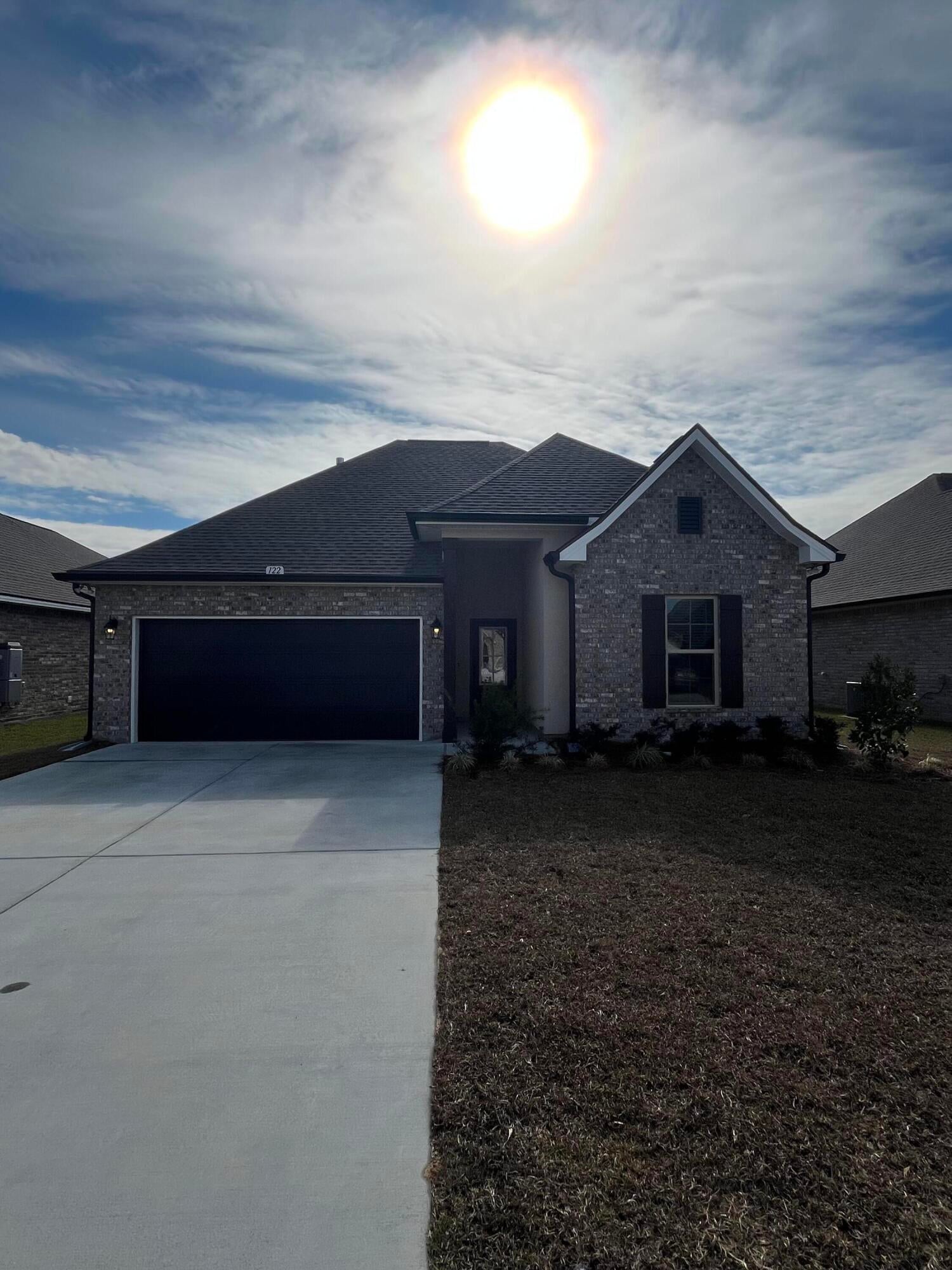 The TRILLIUM IV B in The Bluffs at Lafayette community offers a 3 bedroom, 2 full bathroom, open and split design. Upgrades added (list attached). Special Features: double vanity, garden tub, separate shower, and walk-in closet in master bath, kitchen island, walk-in pantry, boot bench in mudroom, covered porches, undermount sinks, LED lighting throughout, recessed lighting, crown molding, ceiling fans in living and master, custom framed mirrors in all baths, smoke and carbon monoxide detectors, landscaping, architectural 30-year shingles, flood lights, and more! Energy Efficient Features: tankless gas water heater, kitchen appliance package with gas range, vinyl low E windows, and more! Energy Star Partner.