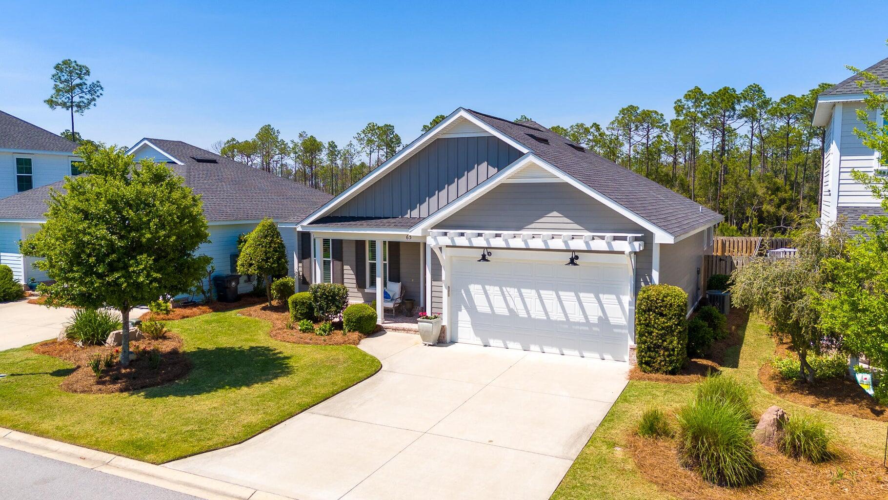 MOTIVATED SELLER HAS MOVED! READY TO MOVE IN!!!   PRICE REDUCED on this JUST LIKE NEW WATERSOUND ORIGINS home. BEST PRICE for this 1725 sf EZ ONE LEVEL living, this home offers a spacious OPEN floor plan with 9-foot ceilings, quartz countertops, Bosch gas stove, tankless water heater and luxury vinyl flooring--all combining comfort with coastal style. Beautifully integrated BUILT-IN CLOSETS offer both functionality and seamless design.  The BELLA PLAN  includes 3 bedrooms, 2 bathrooms, and a 2-car garage. ChargePoint EV garage unit  installed  & ready for the new owner. 
Origins community IS A GREAT LOCATION that boasts outstanding amenities, fostering an active & social lifestyle, within close proximity to stunning beaches, shopping, & dining. Surrounded by the natural beauty of the Florida Panhandl