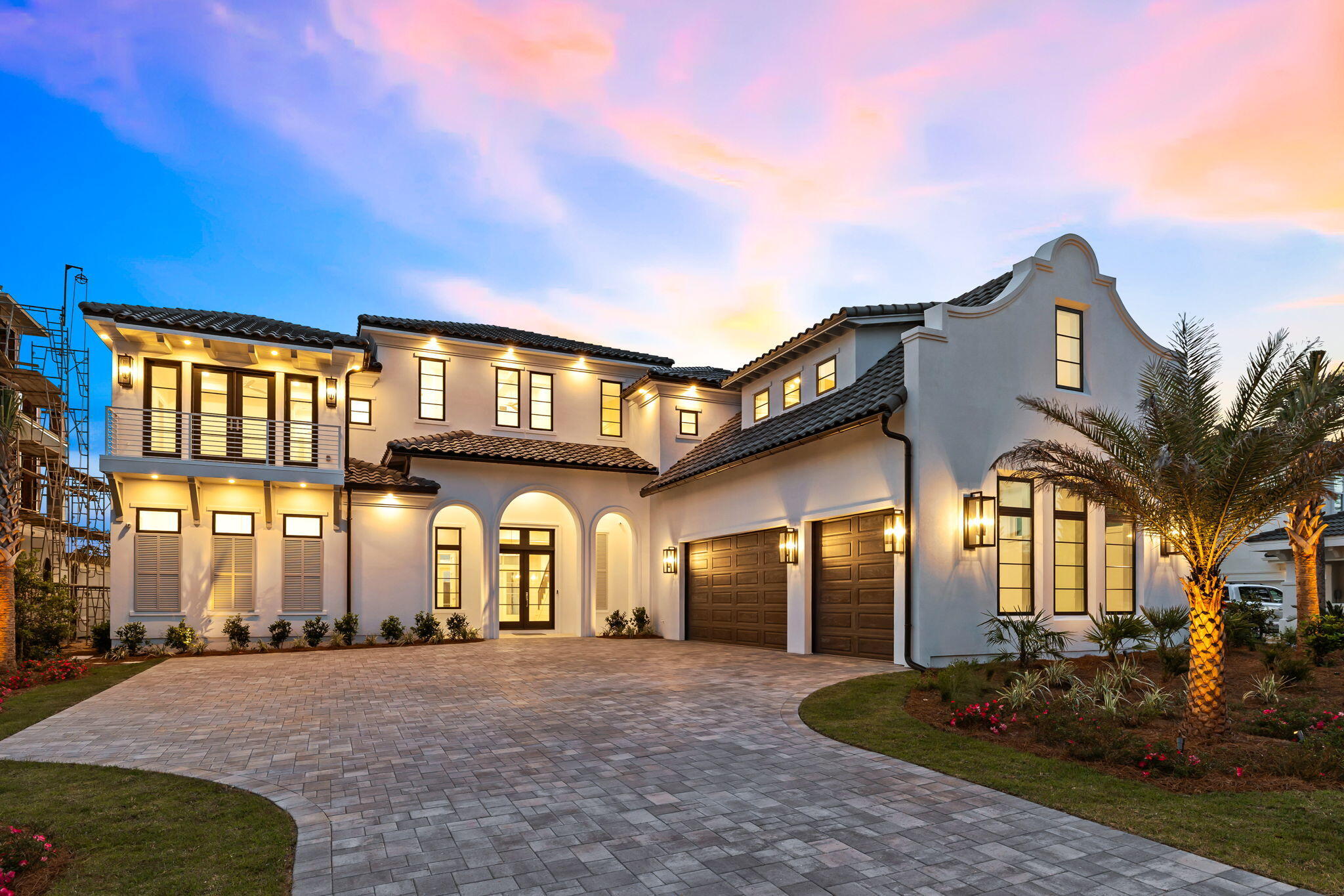 Pristine architectural design, paired with sweeping golf course views and breathtaking Gulf vistas, define this exquisitely positioned new construction in the exclusive, gated, non-rental neighborhood of BellaMar at Gulf Place. 

Perched 31 feet above sea level, this property offers a unique vantage point, blending luxurious living with serene natural surroundings. Masterfully built, this 7,476 sq ft Mediterranean retreat has been beautifully designed to capture it's striking architectural features including a soaring parapet wall as well as a highly functional design including an impressive oversized three car garage and private parking court as well as resort style amenities all of which are situated on the coveted Santa Rosa Beach Golf Course and providing direct deeded beach access.

Poised at a high elevation, gulf views abound from each of the three viewing levels of this home which abundantly provides ample indoor and outdoor living space with five full bedroom suites, a bunk room, office space, elevator and multiple levels of open living. 

The first level is optimally configured for entertaining featuring an expansive open living, kitchen and dining space primarily focused on the exceptional western vistas of the golf course as well as the resort style private pool & spa. 

The chef's kitchen is a premier configuration offering ample custom cabinetry, gas-powered Wolf range, stainless appliances with a massive center island including a built-in Sub-Zero refrigerator and adjacent fully equipped butler's pantry. 

The primary living areas effortlessly flow to the rear entertaining deck, which yields an oversized resort style pool and spa, covered lanai with outdoor kitchen space and half bathroom. Fenced privacy and low maintenance landscaping allow for an enjoyable golf course frontage that provides both views and ambience. 

The primary suite is also located on the first level and offers ample space for storage with a massive primary and secondary closet as well as the primary bathroom with dual vanities and makeup space, large walk-in shower and private water closet. 

The second level hosts four large bedroom suites with en-suite baths as well as a large exercise, bonus and game rooms which hosts a built-in linear fireplace and access to the top floor viewing deck. Other notable features on the second floor include a large bunk room with 4 built-in queen bunk-beds as well as a two built-in kitchenettes and a full second laundry room.

The third level viewing deck offers excellent accessibility while hosting the perfect location to soak in endless sunsets over the Gulf of Mexico as well as the pristine naturalistic surroundings of the golf course. 

BellaMar is the ideal primary residence or secondary home with exceptional positioning on the west side of 30A providing excellent proximity to the Santa Rosa Golf & Beach Club, Gulf Place with it's premier restaurants, shopping and entertainment as well as private, deeded beach access along pristine white sand beaches and emerald green waters.

Please reach out to us today for the cost-to-own figures for the property.