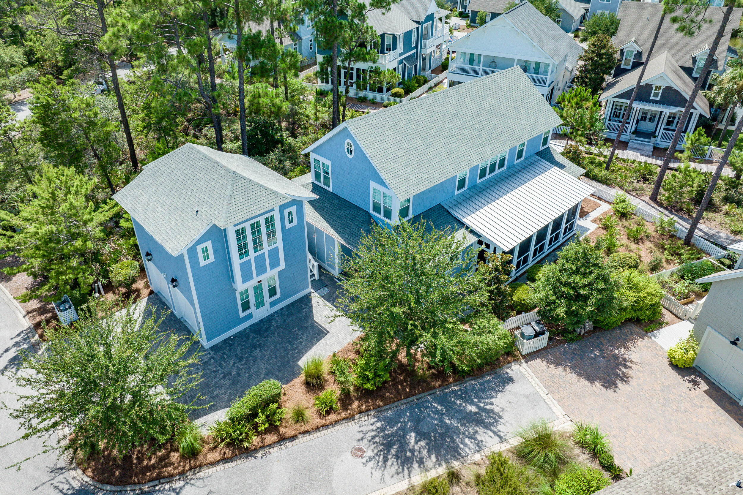 This beautifully FURNISHED home is perfectly situated in Watersound West Beach, offering the best of 30A living with easy access to Seaside, Watercolor, Greenway Station, and The Big Chill. Enjoy the quiet charm of this gated community with private beach access, a community pool, and clubhouse, all just steps away from popular dining, shopping, and entertainment.

The 4-bedroom, 5-bath home features an open floor plan with a chef's kitchen, first-floor primary suite, and spacious living areas. A detached carriage house with extra living space and two-car garage completes this property.

Experience coastal living at its finest with unmatched convenience to the area's most sought-after spots. you'll find two additional bedrooms, each with ensuite baths, ensuring privacy and convenience. A bunk room includes four bunk suites, ideal for accommodating guests or children. The property also features a charming free-standing carriage house with additional living space, a two-car garage with ample storage, and a fourth bedroom above, perfect for guests or as a private office space.

Designed for year-round indoor/outdoor living, this home offers two spacious porches for relaxing and enjoying the coastal breeze. A picturesque boardwalk behind the house leads to the community pool, clubhouse, and private beach access. Watersound West Beach is known for its tranquil environment and beautiful surroundings, offering amenities such as a community pool, clubhouse, and deeded access to fishing and other recreational activities. The location is close to Deer Lake State Park and popular destinations like Seaside, Seagrove, Watercolor, and The Big Chill, offering the best of 30A living while maintaining a secluded oasis of tranquility.

383 Sextant Lane is more than just a home; it's a lifestyle. Whether you're seeking a permanent residence or a vacation getaway, this home offers a perfect blend of elegance, comfort, and coastal charm. Don't miss the opportunity to own this exceptional property in one of Santa Rosa Beach's most sought-after communities.