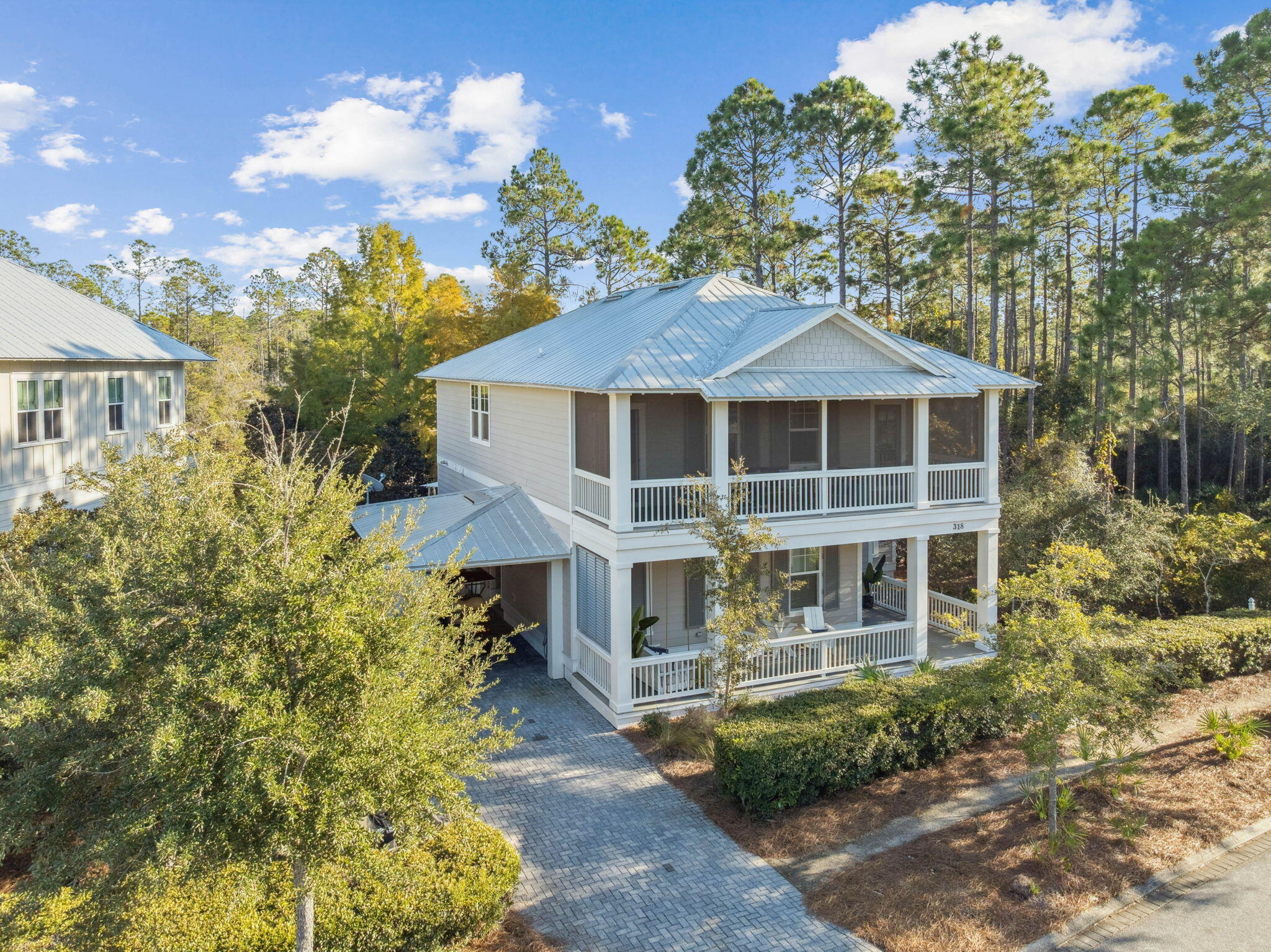 Discover a truly unique residence in the heart of Watercolor, where captivating POND views and a lush preserve envelop the home, creating an exclusive sanctuary like no other. 

This beautifully appointed property features 4 bedrooms, 4.5 bathrooms, a charming bunk room, and a large carport with room for three additional vehicles, embodying both style and practicality.

With its distinctive custom design, the home offers a ONE OF A KIND lifestyle experience. With exceptional flow, making it perfect for both intimate family gatherings and entertaining guests. 

Backyard views from every window of a large pond with dock

The driveway provides generous space for  cars and golf carts,for everyday living.

Dragonfly pool,The Lazy river and Beachclub are all nearby! The home has been updated with Quartz countertops throughout!  The first floor features a primary bedroom with an en-suite bathroom, storage space under the stairs, a walk-in pantry adjacent to the kitchen, and enclosed outdoor storage, as well as a powder bath. Custom designed laundry room has been updated to include a bar area with built-in cabinetry, an ice maker, and a Kitchen Aid beverage fridge. The kitchen has been updated with designer tile and quartz countertops.

The second story features a Master Retreat with a separate living area, bath, walk-in closet, and balcony offering a view of the pond. There are two other bedrooms with baths and a screened-in porch. There is a media room/den and a bunkroom on this floor.
The home was built in 2012 and features hardwood floors, remodeled baths, and has undergone numerous upgrades throughout. This beautiful home needs to be seen in person to be fully appreciated.  A very serene setting that you won't see elsewhere in Watercolor.