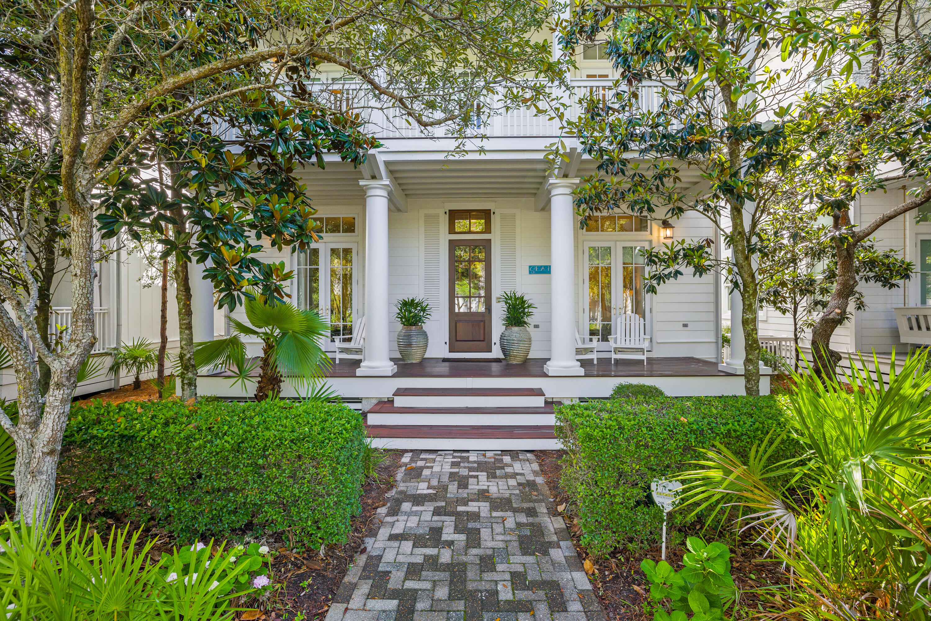Professionally decorated and masterfully designed by Christ and Associates, this Phase I WaterColor home is in a league of its own with a carriage house and private pool just a stone's throw from WaterColor Beach Club and the shops in WaterColor. Boasting five bedrooms, five bathrooms and more than 4,100 square feet of living space, this home has never been rented but promises great rental potential due to its coveted locale. Still enjoyed by its original owners, this home is a study in privacy and serenity with nearly 1,000 square feet of balconies and porches and bedrooms that all have their own private baths, positioned on a sought-after lot facing Scenic Highway 30A. The kitchen was remodeled shortly after purchase to open up the space, which is complete with a Sub-Zero refrigerator, Wolf gas range and Bosch microwave. The second-floor owner's suite has its own private sitting room, balcony that overlooks the pool and freestanding bathtub in the en suite bath. A two-story carriage house includes one bedroom and one bath over a two-car garage. Notable enhancements to this home include custom draperies, a Sonos sound system, Control4, three A/C units, wood flooring throughout, fireplaces in the living area and owner's suite, separate media room and wet bar. Location is paramount here, putting you in the middle of all of WaterColor's exclusive amenities including nine pools, a private beach club and 35 miles of walking/bike paths. WaterColor is ideally positioned east of Grayton Beach and west of WaterSound, central to the best in dining, boutique shopping and recreation opportunities on 30A, Highway 98 and beyond.