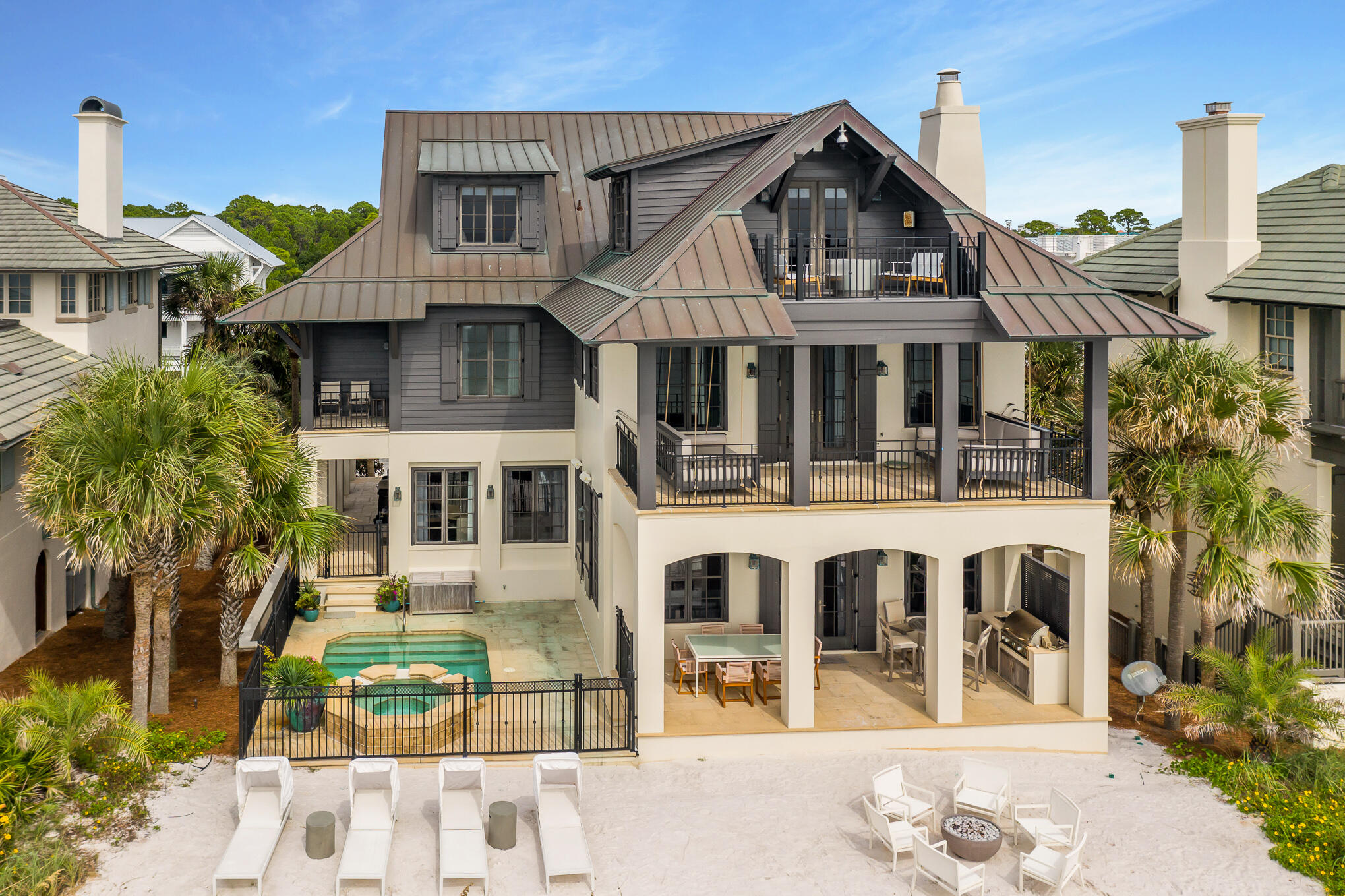 This incredible Gulf-front residence designed by architect Dawn Thurber and built by John Willis Homes has just been updated with new interior and exterior furniture curated by Harrison Design Atlanta – Karen Ferguson, ''Southeast residential Designer of the Year.''  Located front and center within The Retreat, it is only two lots to the east of the redesigned Gulf-front Beach Club, which features an infinity edge pool and private beach access and will open Memorial Weekend 2022.   Very few homes have four complete levels of living space and even fewer have a Gulf Front outdoor entertaining area with unobstructed views of the beach...this home has it all! Entering the home through the second-floor main entrance, your attention is immediately drawn to the rear of the home where the private sugar white sand beach and emerald green waters contrast. This second level has beautiful travertine flooring throughout the formal dining room, breakfast room and adjoining gourmet kitchen creating a light atmosphere that is as chic as it is comfortable. The galley kitchen is designed to accommodate multiple chefs with two sinks, two distinct prep areas and professional grade appliances. A cavernous pantry lends increased capacity to the already ample cabinet storage. The kitchen overlooks a sunken living room and is connected by an elevated bar top. Wood ceiling beams nod to the antique hardwood floors while a limestone fireplace surrounded by built-in cabinetry enhances the sense of permanence. Tall windows and French doors expose a generous outdoor entertaining space with covered porch, built-in grill, outdoor fire pit and four custom lounge chairs each with their own privacy shade.   The swimming pool and hot tub are embedded as one with the hot tub acting as the waterfall into the pool.   The centerpiece of the home is a custom radial staircase, servicing the first, second and third floors, built on-site to exacting specifications. Its graceful curves are accented by an iron balustrade. A residential elevator is also available to transport you to any of the four levels. Two large guest bedrooms with en suite baths and laundry are on the third floor along with the secluded master retreat all with reclaimed heart pine flooring. This decadent space is optimally positioned to fully capture the unobstructed Gulf views. French doors open onto a deep covered porch, with two hanging swing beds, to be enjoyed by the owners of this private space. The master bedroom hosts a sitting area at one end and a fireplace flanked by built-in cabinetry on the other. A glamorous master bath features a towering expanse of mirrors over the long double vanity, walk-in closet with built-in cabinetry, spa tub and walk-in steam shower. Ascend a spiral staircase or take the elevator from the third floor to a secluded fourth floor bedroom retreat with an adjoining office boasting built-in desks and overhead shelving, a full bath and a Gulf-front sitting area. This multi-purpose space can be utilized both as a home office, restful retreat or guest suite. The fourth-floor balcony showcases unprecedented shoreline vistas; to the west toward Destin and to the east toward Panama City Beach.   There is a wet bar in the fourth-floor bedroom to help you enjoy the evenings sitting around the fire pit on the deck of one of the highest points on the Gulf of Mexico.   A short elevator ride to the ground floor reveals an additional guest bedroom with en suite bath and large bunk room comfortably sleeping up to six on its three sets of bunk beds.  A storage room, accessed through the bunk room, can store your pedal-drive kayaks, SUP boards and fishing gear. Adjacent to the bunk room is an additional full bath and huge laundry room with sink and refrigerator. The first floor provides an ideal retreat for adults and children alike. The Retreat is a rental-restricted, gated neighborhood on 90 acres of land along 3,000 feet of Gulf frontage, a third of which will be forever protected and never built upon. The Retreat features 90 exclusive home sites, permanent nature preserve areas, a picnic pavilion and canoe launch on Draper Lake, and three private beach access points in addition to the new Gulf-front Beach Club.
"	Home Updates 2020-2021
o	New window treatments
o	New interior and exterior furniture curated by Harrison Design Atlanta  Karen Ferguson "Southeast Residential Designer of Year"
o	Full exterior painting including all hand railings, shutters, siding, stucco and more
o	Upgraded Copper Roof installed 2020
o	New Garage doors and mechanicals
o	New light fixtures 
o	New cabinet handles 
o	Refinished Hardwood floors and staircase handrails
o	All door and window mechanicals serviced, repaired, or replaced
"	Updated Smart home with Control 4 System
o	Whole Home Automation  AC  Audio  Video Distribution  Security  Pool  Lighting 
o	New Control 4 light switches 
o	New living room Bang & Olufsen TV, Center channel speaker and Beolab 18 speakers
o	Updated Internet Routers and 1G Fiber Optic Service
o	Video and Sound Distribution throughout with in-wall speakers and upgraded amplifiers
o	AV Rack located in utility closet for easy access and maintenance
o	New exterior wall mount speakers 
o	New exterior security cameras
Specific Home Differentiators:
"	Owner's property extends to the "Mean High Water Line" 
"	One of only three homes in the Retreat with double beach armoring  steel plates and geotubes - providing valuable storm protection and exceptional views.
"	Unique Gulf Front Outdoor Entertaining Area - unobstructed Gulf Front views with outdoor beach entertaining space on main level  this is the only home to our knowledge with a private sandy beach outside the main level with an unobstructed view of the beach. 
"	One of the highest points in Florida along the Gulf Coast. Must see to fully appreciate!
"	Geothermal HVAC system and water heaters ensures long-term operating efficiency, reduced maintenance, and reduced outside noise. A de-humidifier system was added in 2018 for additional air quality and comfort
"	Elevator access to all four levels
"	Complete home water filtration system including kitchen ozone filtration and more.
This Gulf Front residence is sold fully furnished. All measurements are estimates and buyer should verify that which they deem important.