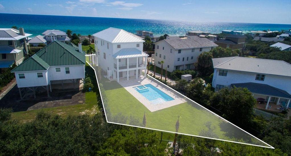 Amazing Second Row new home on 30A. Professionally fully furnished. Panoramic Gulf Views, Huge Yard, block construction with full impact glass. Gorgeous Modern Finishes, expansive decks. Amazing pool with plenty of room for a complete backyard oasis. 2.5 car garage with room for a golf cart. No HOA. Direct Access to the 30A Bike Path from the back yard. Gourmet kitchen with Thermordor Appliance package, 6 burner gas range with pot filler, pantry stunning quartz finishes, Huge Great Room, perfect for entertaining. Hardwood floors throughout. Being sold fully furnished and move in ready. Main level features two bedrooms and full bath, with one bedroom allowing a separate area for the kids. The 2nd level features the kitchen, great room and an additional guest bedroom complete with a huge covered front deck over looking the Gulf of Mexico and a 2nd large rear covered deck overlooking the swimming pool and expansive back yard.  The 3rd floor features a master suite to die for, with large walk in closet, amazing 5 piece master bath with gulf views and a private covered patio over looking the gulf.  This is one of the finest master suites on all of 30A.  There are also two additional guest bedrooms and the laundry room all in close proximity.  This home is truly amazing!