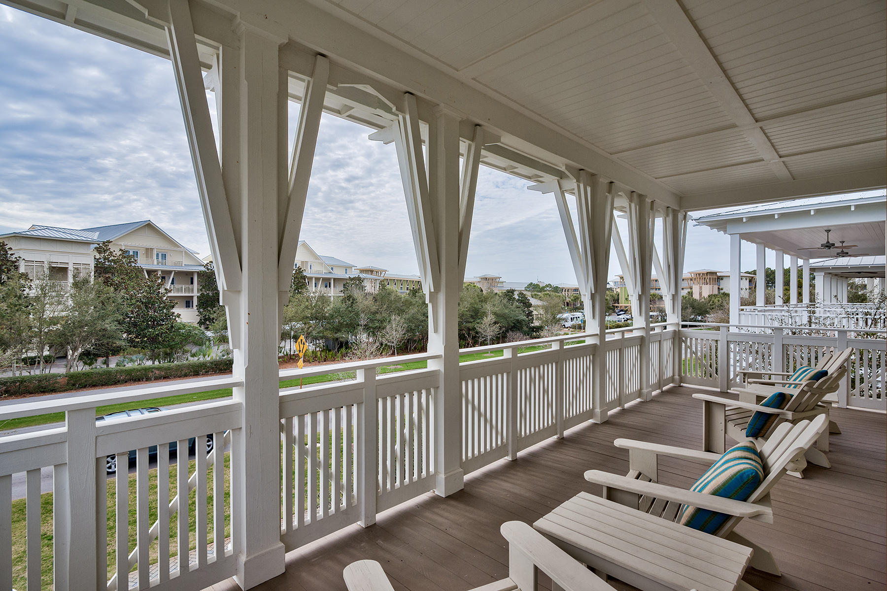 Don't miss this centrally located, spacious, and impeccably maintained WaterColor oasis right on Scenic Highway 30A. Fully furnished and turnkey ready with high-end, designer dcor, lighting, and furniture- this elegant coastal gem could be your dream beach home! The main level has 12' ceilings with transoms above for plenty of natural light. Beautiful hardwood floors can be found throughout the home plus many trim details on the interior and exterior. Walk through one of the many screened-in porches into the large downstairs living room perfect for entertaining. The adjoining gourmet kitchen is to die for with honed granite countertops and Sub-Zero and Wolf appliances, complete with a wet bar that includes a wine cooler, icemaker and plenty of storage. The second floor living room is ideal for children and guests! See the sparkling blue waters of the Gulf of Mexico from the 3rd floor tower as well as the roof tops of Watercolor and Seaside. Each of the 6 bedrooms in the house has a private adjoining bathroom and TV's throughout! Comfortably stay in one of the two large master bedrooms, while the kids enjoy the additional 3 queen bedrooms and bunkroom. There is ample space for the entire family. To add to this beautiful home's charm, step outside to the adjoining carriage house above the garage that features a bedroom, bathroom, and full kitchen.  Perfect for additional rental space, mother-in-law suite, or deluxe home office! WaterColor has everything to offer-step outside your door and walk to the WaterColor beach access, WaterColor beach club, or bustling town center for fine dining and shopping.