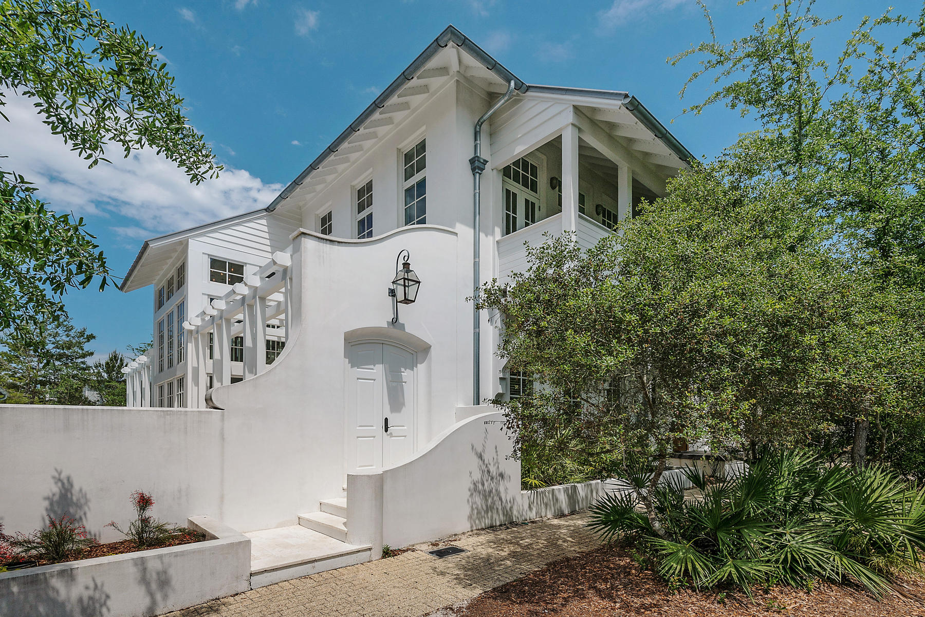 A rare find in Rosemary Beach, huge, private Courtyard with pool and Classy styled Home all bathed in sunlight! The space is made for either long hours of relaxation or entertaining on a grand scale. The all block home was designed by Geoffrey Moen, Architect, and built by Christian Tennant. An open living/dining/kitchen on a reverse floor plan adds to the spacious feel. The views of the Cabana Pool across the street may be enjoyed from the Living room Balcony. Level 2 also host the Master Bedroom Suite. A Guest room, a 2nd Master Suite and 4 Bed Bunkroom enjoy the Level 1. The lot is accessed for parking along a rear lane which allows for a much coveted 4 parking spaces. The Town of Rosemary Beach is only 2 blocks away for your Restaurants and shops.