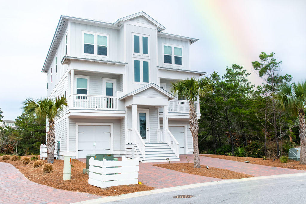 One of the most beautiful homes in the community of Prominence is located in a prime location south of 30A. Home rests on a double corner lot, one of the largest, with natural vegetation creating unique privacy. 3-story home with elevator is furnished with coastal colors and includes bikes, chairs and outdoor games, a true turnkey rental. Gourmet kitchen, relaxing living areas, and 6 bedrooms each with an ensuite bathroom create comfortable accommodations. Enjoy a short stroll to the pool and The Hub. - Home has parking for six vehicles and is wired for Smart Home. The Hub offers shopping, restaurants, salons, live music, and is the epicenter of fun events on 30A. Private community shuttle service or a golf cart ride provides easy access to nearby beaches. The public beach access points are Deer Lake State Park, Walton Dunes, Gulf Lake Estates and Santa Clara. HOA fees are $150 per month which includes irrigation, landscaping, beach shuttles, security and fitness room.