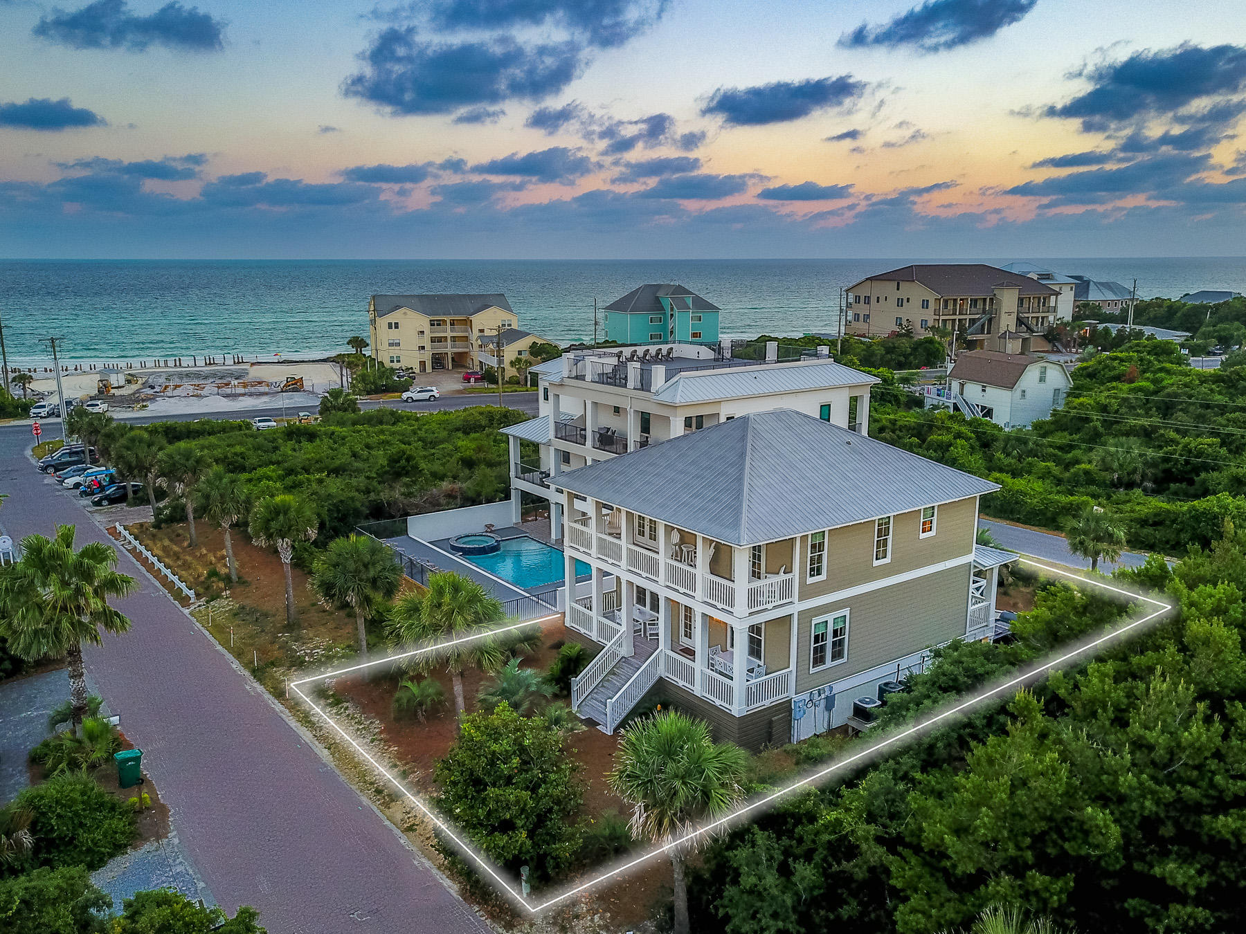 Welcome to 52 Hilltop Drive, conveniently located in the heart of Santa Rosa Beach. This luxurious home offers two master suites, as well as four additional bedrooms and five additional bathrooms- which altogether sleeps 15 people! Perfect for entertaining and for visiting family and friends. 

Enjoy the breathtaking Gulf, lake and beach views from the spacious, covered balconies. With a private pool and nearby public beach access, this home is perfect as a primary residence, vacation rental, or second home! Enjoy the crystal clear water and sandy white beaches- just across the street! Hilltop Heaven can host your beach vacation desires, and more. Hilltop Heaven features stunning views of the dune lake behind the home, and gorgeous views of the beach and Gulf from the front. Comfortably host multiple families or groups with three bedrooms and two bathrooms on the 1st floor and three bedrooms with two bathrooms on the 3rd floor, conveniently separated by the living, kitchen, and dining on the second floor.

Rest and focus on the surrounding beauty of the ocean views, dune lakes, and white sands with generous space to encourage deep relaxation and refreshment with plenty of air and room to breathe. Enjoy moments together with an entire floor devoted to the large open-concept living, kitchen, and dining room.

Don't hesitate to schedule your showing today! Enjoy life how it should be lived on 30a and in Hilltop Heaven