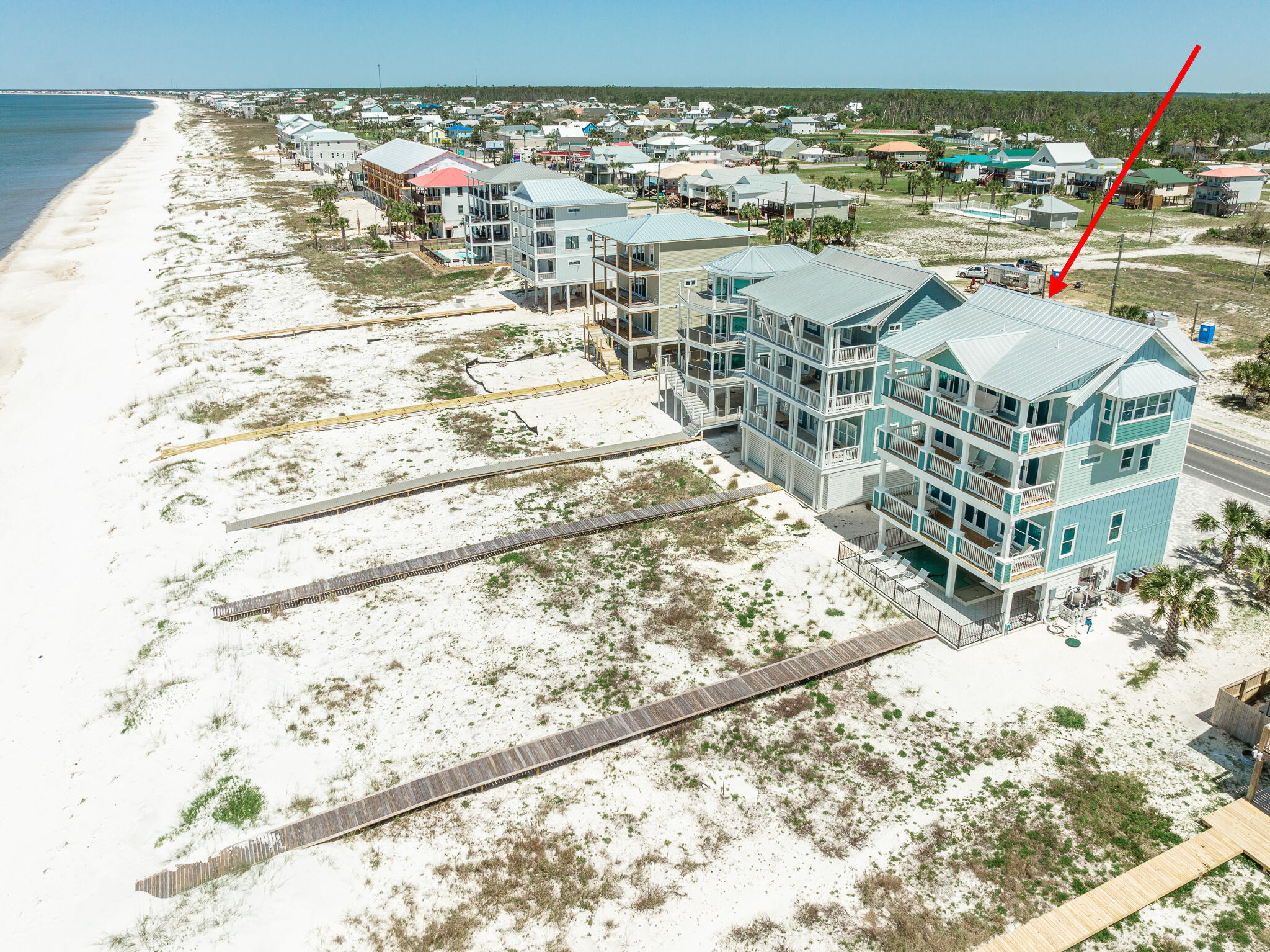 This is one of if not the nicest homes from Mexico Beach to St. Joe Beach. The owner of this custom home spared no expense & skipped no attention to detail in this incredible home. There hasn't been a home of this class listed before in this area. Beachfront pool with outdoor bathroom/outdoor shower & oversized boardwalk plus elevator access on floor one. Floor two is a kitchen and living area to die for with unbelievable features & Bluestar appliances, custom lighting, trayed ceilings, wood framed 80' TV, and more. The next floor features 2 large gulf facing suites plus a bunk room w/full bath. Top floor has a full br/ba and then one of the most impressive master bedrooms and huge master baths you'll ever see. The furnishings are also exquisite & the home is sold fully furnished. exquisite & the home is sold fully furnished.  Qualified buyers only for showings. Never rented.