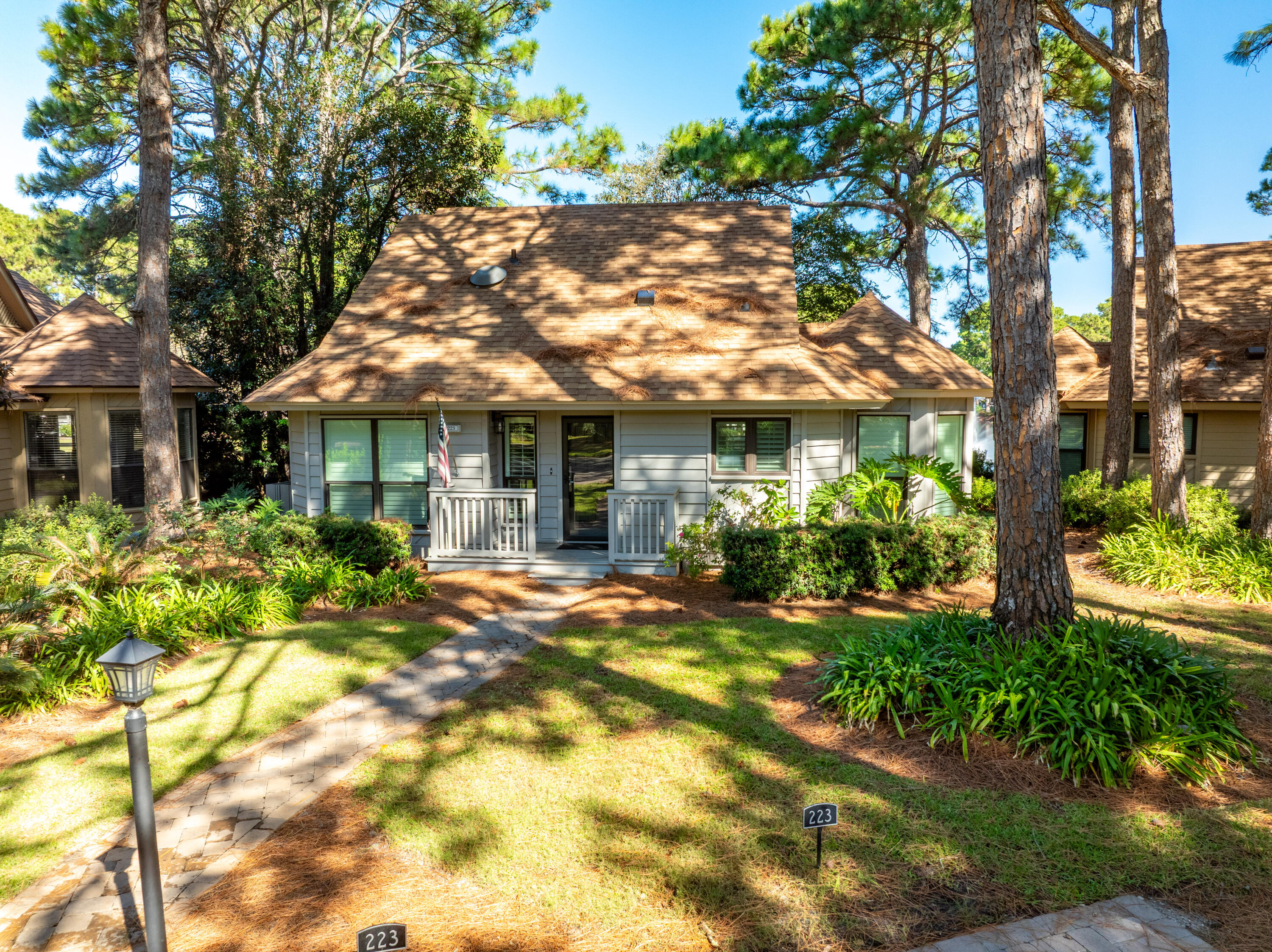 Perfectly positioned along the central lake in the coveted Fairways neighborhood of Sandestin Golf and Beach Resort, this beautifully updated two-story residence combines timeless design with modern comfort. Every detail has been thoughtfully curated, featuring wood-look tile flooring, casement windows, and quality finishes throughout. The gourmet kitchen is both elegant and functional, showcasing custom Shaker-style cabinetry, quartz countertops, a subway tile backsplash, Kohler farm sink, and stainless-steel appliances. A central island offers abundant storage and bar seating, making it the perfect gathering spot for family and friends. An octagonal dining area surrounded by windows provides panoramic views and seating for six, while the inviting living room features a remote-controlled TV lift cabinet, a new performance fabric slipcovered sofa, and swivel chairs for relaxed conversation. The sunroom adds another cozy retreat, enhanced by custom sectional seating, a beadboard ceiling, and ample natural light. For entertaining, a hidden bar area with a wine refrigerator is cleverly tucked under the stairs. Upstairs, the space has been masterfully redesigned to include a spacious family room and a dedicated desk area for work or study. The primary suite is a true sanctuary, boasting a wall of windows framing expansive lake views wake up to the sounds of nature or enjoy complete serenity behind blackout shades. The primary bath offers a floor-to-ceiling marble shower, custom cabinetry, and ample closet space. Downstairs, two guest bedrooms each feature en suite baths with quartz countertops, custom tilework, and glass shower doors, while the laundry room is outfitted with front-loading Samsung washer and dryer and custom cabinetry for convenience. Step outside to experience outdoor living at its finest on the expansive back deck one of the largest in the neighborhood overlooking the tranquil lake. Enjoy grilling, fishing from your private dock, or simply relaxing as you take in the peaceful views. Whether you're seeking a short-term rental investment, a second home, or a permanent residence, this lakefront gem delivers the perfect blend of elegance, comfort, and resort living in one of Sandestin's most desirable communities. 

As an introduction to the Sandestin lifestyle, we invite our new owners to explore amenities that make Sandestin special. The listing brokerage and seller(s) are presenting the buyer(s) of this property with (2) 90-minute rounds of Tennis court time, a golf foursome at one of our three championship courses, and a round of golf for up to four (4) players at the unrivaled Burnt Pine Golf Club.

Sandestin Golf and Beach Resort features more than seven miles of beaches and pristine bay front, four championship golf courses, 15 world-class tennis courts, a 226-slip marina, a fitness center, spa and celebrity chef dining. Shop, dine and play at the charming pedestrian village, The Village of Baytowne Wharf and more. Inside the gates of the resort, residents enjoy a balanced lifestyle of high-class living, spanning the 2,400 acres from the beach to the bay. Everything within the gates of the resort is accessible by golf cart or bicycle. The entire resort is interconnected by miles of pedestrian, bike and golf cart paths that weave through groves of live oaks, meandering past natural lagoons, fountains, man-made lakes, and meticulously landscaped fairways.