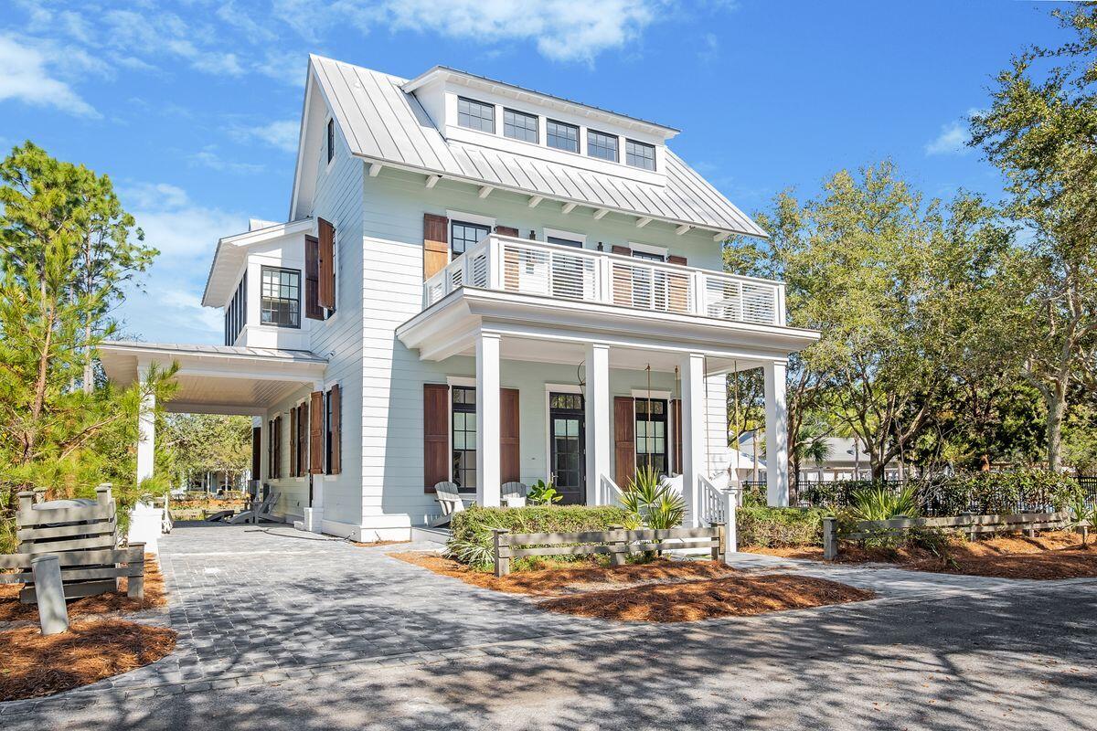 Renovated Home With Exceptional Rental Potential Overlooking Camp WaterColor!  Few properties are in the same league as this outstanding 5,700-sq.-ft. home occupying a prime lot overlooking Camp WaterColor. Completely renovated from the hardwood floors to the airy 12-ft. ceilings on the first floor, it includes new AC units, lighting, fixtures and an efficient tankless water heater. The generously sized open kitchen has stylish new cabinetry, quartz countertops and a host of appliances in this all-important hub of the home. 6 bedrooms + Bunk have something for every guest, from the first-floor guest suite to the third-floor his-and-hers en bunk suites. They share a well-planned flex space for young guests to hang out and watch TV when they're not at the pool, riding the lazy river or enjoying beach activities nearby. Restaurants and bars are a short stroll or golf cart ride away. Head outdoors for a cookout at the summer kitchen. The game-sized yard has ample space and approval for a private pool. Relax on one of the multiple shady porches presiding over views of Wood Fern Park and open green space. Fully furnished, this one-of-a-kind home is fully updated and offers great rental potential with annual projections of $370,000+. Far more than a luxury beach house, this exceptional property offers a prime investment opportunity in one of the most coveted locations in WaterColor. Enjoy access to the renovated WaterColor Beach Club, the ultimate in resort-style amenities with retail spaces and dining as well as multiple pools including zero-entry on the lower deck, private cabana rentals and access to the sugar-white sands of the Gulf of Mexico.