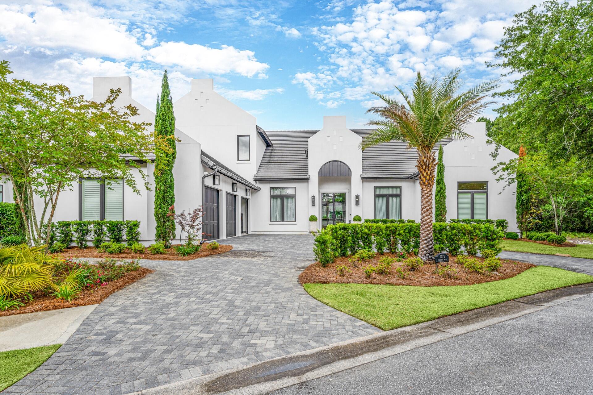 WOW !!LIKE NEW SPECTACULAR BURNT PINE HOME at SANDESTIN has 4 Bedrooms 4.5 baths, Study, Pool & Spa, 4405 sq. ft. with a 3 Car Garage.  Home sits on a  Lake Overlooking the Burnt Pine Golf Course with a Great Open Floor Plan with Large Outdoor Living Area. House has Tall Ceilings with Beams, 3 Fireplaces, Beautiful Hardwood Floors thru the Entire Home. Gourmet Kitchen with Top of The Line Appliances(Wolf, Sub Zero) opens to the Living Area of the House. Large Walk In Pantry, Wine Fridge and Ice Maker.
 First Floor Private Bedroom Suite with Vaulted Ceiling and Fireplace, Spacious Bath with Large Walk In Shower, Stand Alone Tub and Custom Closet. Also on First Floor is a Dining Area, Study, Powder Room, Laundry and Mudroom. Upstairs has 3 Bedrooms with their Own Bath and a Second Living Are