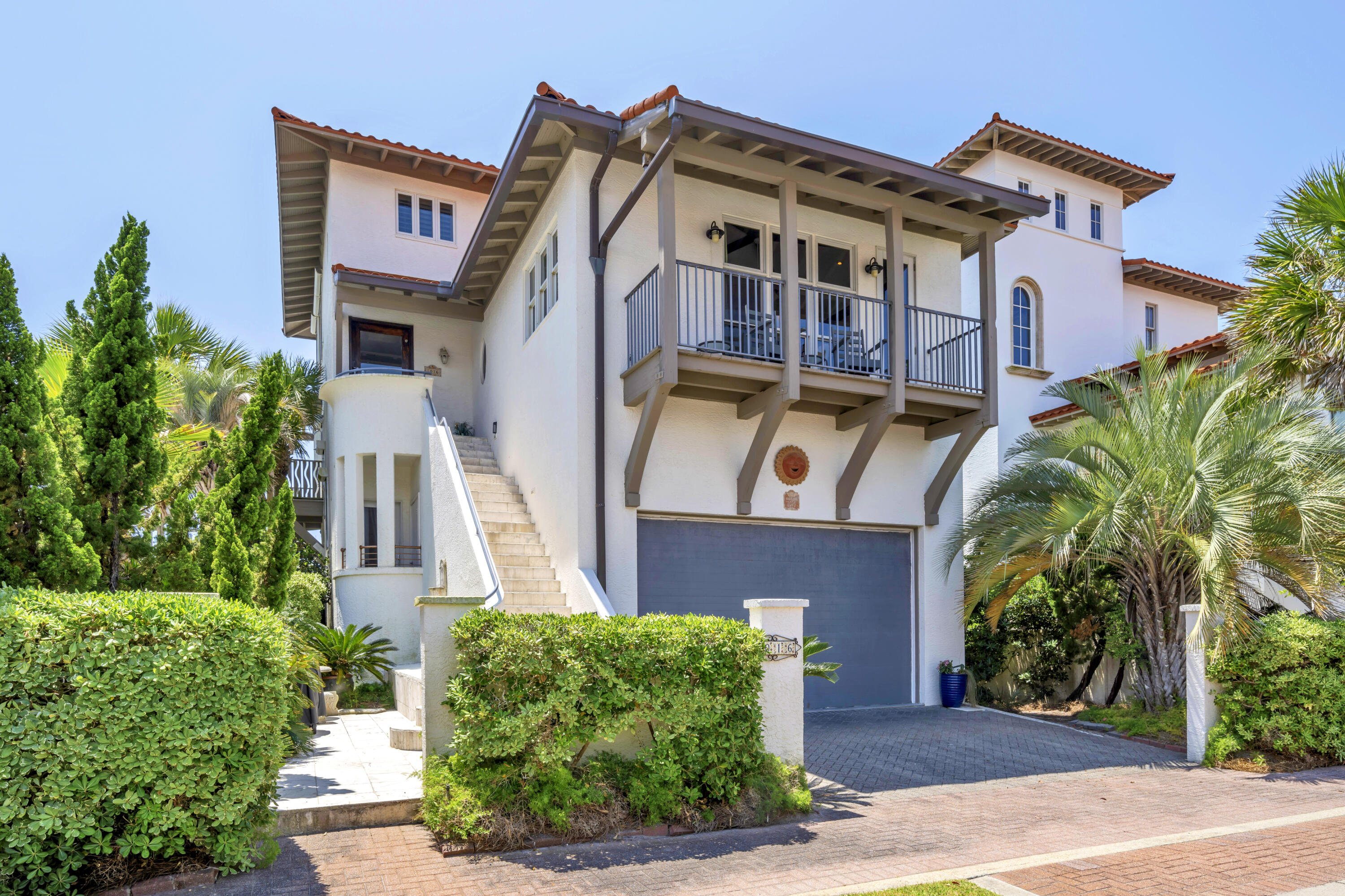 With uninterrupted gulf views from all three levels and direct access to sugar-white sands, this distinguished residence in the gated enclave of Vizcaya at Dune Allen offers coastal living at its most refined. Situated beside the central beach walkover and across from the newly remodeled pool, the home combines privacy, elegance, and convenience in one exceptional package.

Inside, soaring ceilings and three gracious porches frame sweeping views of the shoreline, while details like 100-year-old antique heart pine doors, beams, and cabinet facings—milled in Mobile, Alabama—add a sense of heritage and craftsmanship rarely found in beach homes. The open-concept living area centers around a dramatic five-foot gas fireplace, flanked by custom moldings and glass railings that allow the view to remain uninterrupted. A whole-house water purification system, hurricane shutters on the south side, and a new tile roof offer peace of mind.

Outside, a private courtyard beckons with a Green Egg, propane grill, outdoor shower, and footwashideal after a day on Vizcaya's 1,000 feet of private beach. The first-floor jacuzzi is perfectly placed for enjoying winter sunsets, while the tall-ceilinged two-car garage offers ample space for vehicles and storage. Sold fully furnished (excluding artwork and a few personal items), this home is both a timeless retreat and an income-generating asset in one of 30A's most exclusive beachfront communities.