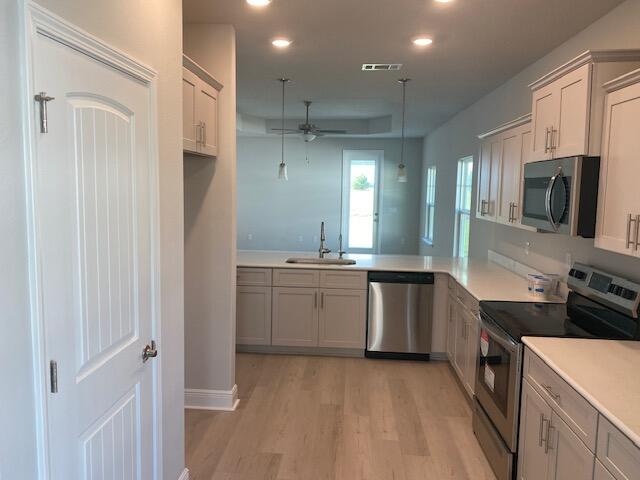 Limited time offer: Receive up to $45,000 price discount on this home. Ask about our 3.99% interest rate buy down promotion with our preferred lender. **Community also has USDA financing with zero down payment for those that qualify. **

THE BLUFFS is a new Freeport subdivision located 3 miles north of the intersection of Hwy 20 and Hwy 331, just a 20 minute drive to South Walton beaches!  
Craftsman style, 3 BR/2 BA.  Interior features 9' ceilings throughout,  10' trey ceilings in the Living Room + M.Bedroom.  Bay windows provide a sunny dining room.  8' entry doors, quartz countertops + durable & stylish  LVP flooring throughout; no carpet.  Sprinklers w/well + pump, fully sodded yard, garage door opener, total electric.