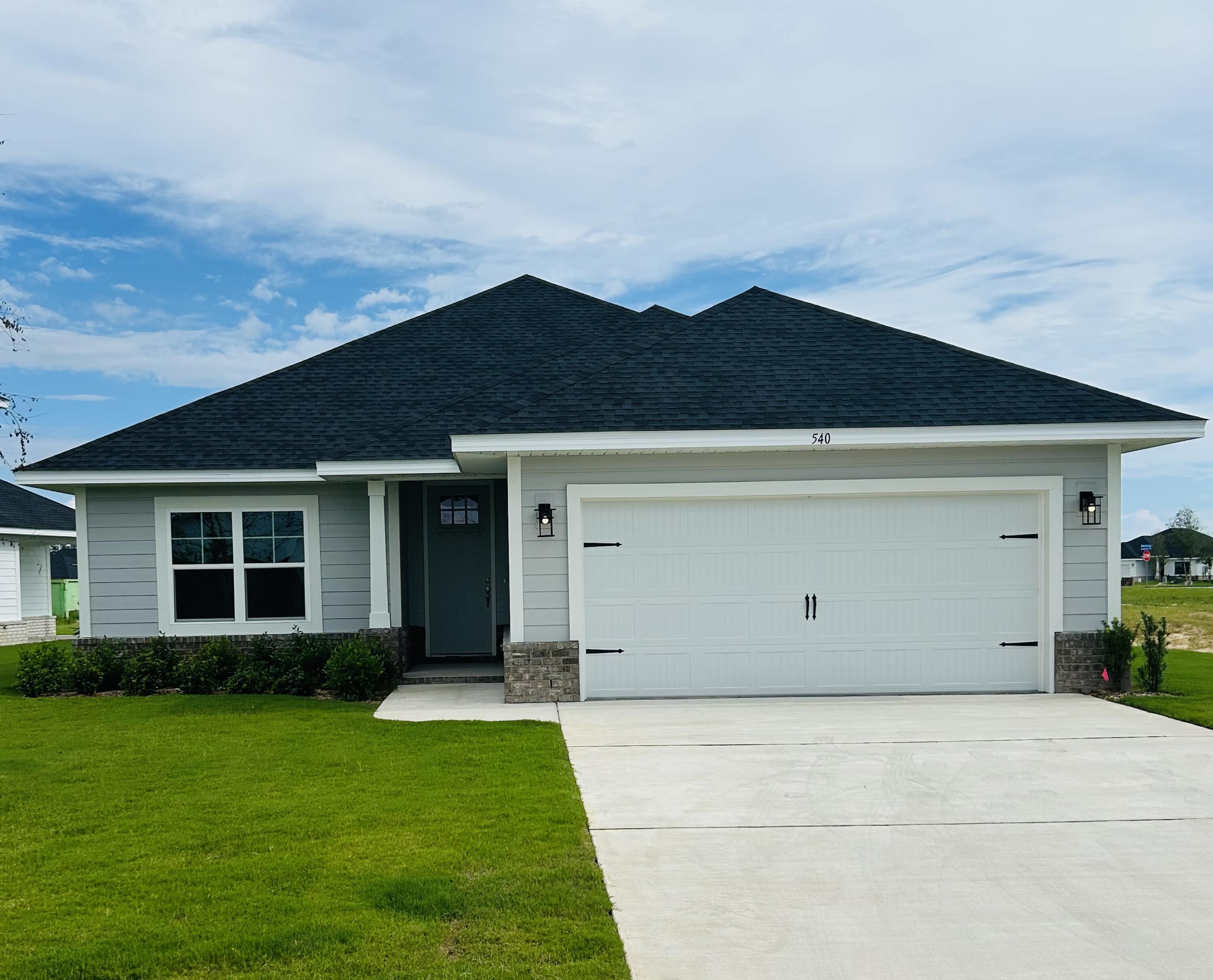 This popular Craftsman-style 3BR/2BA home (currently under construction: (Est. April 2026 completion) is ideally located directly across from the community pool and cabana, offering effortless access to resort-style amenities. Designed with both comfort and style in mind, the home features HardieBoard® siding with a brick skirt, 9' ceilings, 8' entry doors, and CoreTec Pro Plus luxury vinyl plank flooring throughout—no carpet. The spacious primary suite boasts elegant tray ceilings, a generous walk-in closet, and a spa-inspired bath. Quartz countertops in the kitchen and baths, soft-close cabinetry, and a covered patio complete this inviting home, perfect for relaxed everyday living and entertaining. Pics are of a similar home.