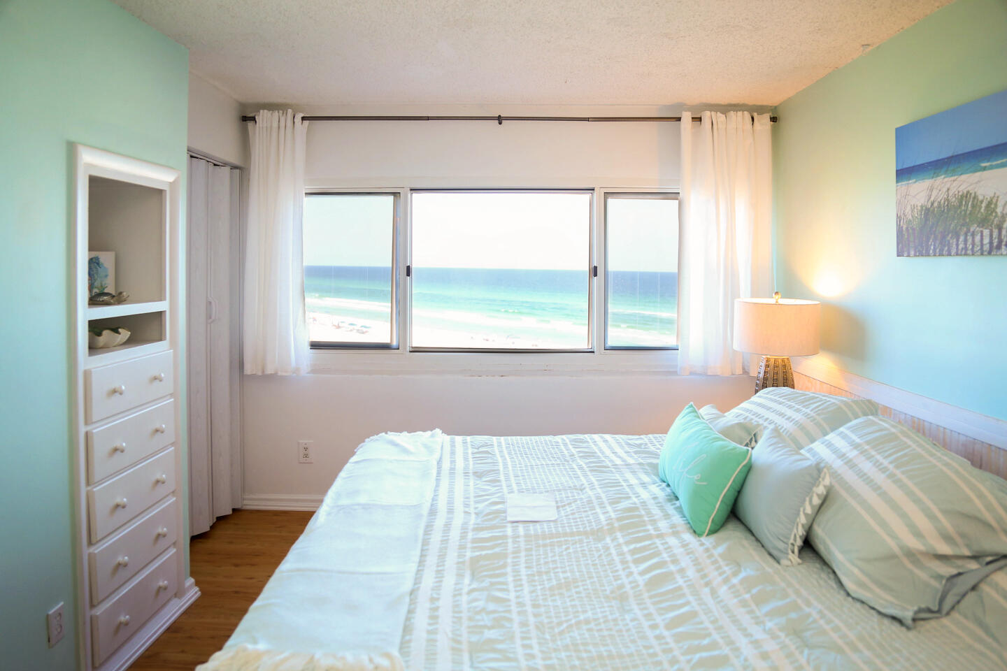 Lowest-priced unit in Pinnacle Port at $249K, well below recent comps. Turnkey 1BR/2BA condo with over 880 sq ft, Gulf and Lake Powell views, and a quiet location near Carillon Beach and Camp Helen. Fully furnished with all appliances, linens, and kitchenware. King bedroom with Gulf view, upstairs living room with balcony, queen sleeper sofa, full second bath (rare upgrade), and stackable washer/dryer. Gated community with 24-hour security, 2 pools (1 heated), saunas, tennis, boat ramp. HOA covers water and internet. Move-in ready and priced to move. Upstairs features open-concept living, dining, and kitchen with Lake Powell views. Dining nook seats four with a Gulf-facing window. Kitchen includes stove, microwave, dishwasher, fridge, and small appliances. Condo lives large with two full bathsunlike most 1BR units here. Located in quiet west end of PCB, just 8.5 miles to Seaside and close to 30A. Perfect for short-term rental or personal use. Community amenities include library, game room with pool table, and walking access to beach and Lake Powell. Strong rental potential with rare dual water views and full turnkey setup.