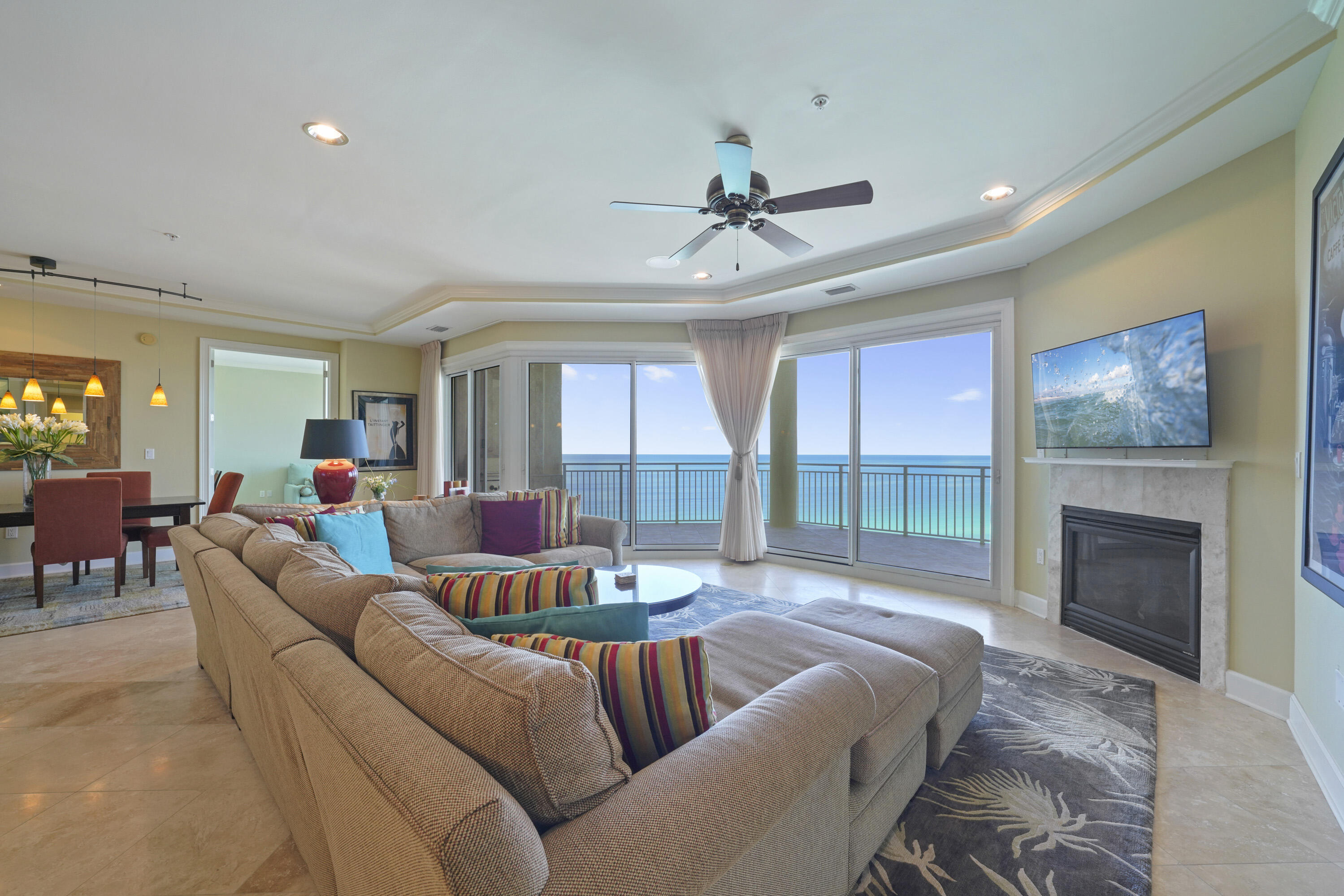 This stunning 4-bedroom, 4-bathroom direct Gulf-front Villa boasts 2,720 sq. ft. of living space and is offered fully furnished. It is one of the few units in the Miramar Beach area that offers a Gulf view from each of the four bedrooms! From the moment you step into this beautiful Villa, you'll be captivated by the expansive views from every angle. Upon entering, you'll be welcomed by an open-concept living space perfect for entertaining guests. The living area features floor-to-ceiling windows that flood the space with natural light and provide panoramic views of the emerald-green waters of the Gulf.  This Villa's features include: travertine flooring in the foyer, living area, kitchen, hallways, and bathrooms; recessed lighting throughout all living areas; surround sound flush mount speakers in the living area; a natural gas fireplace; custom cabinets and granite countertops; soft-close drawers in the kitchen and bathrooms; a bar nook; and a spacious laundry room equipped with a utility sink.

The Chef's Kitchen is a true highlight, featuring granite countertops, a premium stainless steel appliance package, including a "Monogram" range hood, "GE Profile" refrigerator, 5-burner natural gas cooktop, two dishwashers, double sink with individual disposals, and an ice maker.

The Primary Suite is a true oasis, offering "His & Hers" walk-in closets, trayed and coffered ceilings, and a sitting area. The Primary Bathroom features dual granite vanities with soft-close drawers, a temperature-controlled steam shower with dual heads, a spa-like jetted soaking tub with a travertine surround, and a separate water closet.

Grand Dunes offers: "Super Quiet Interiors", semi-private elevators leading into the private foyer of your Villa, 24 hour security, gated entry, lush landscaping, 2 levels of gated underground parking for Owners, private heated pool, Owner's Lounge with Fitness Room, Over-Flow Suites for guests, 200' of deeded beach, a Lagoon Style Gulf Front Grand pool area, lighted waterfall and beach service.

"Grand Dunes is the Emerald Coast's Most Desired Rental Restricted Beachfront Development"

Call to schedule your private viewing of this beautiful Villa today!