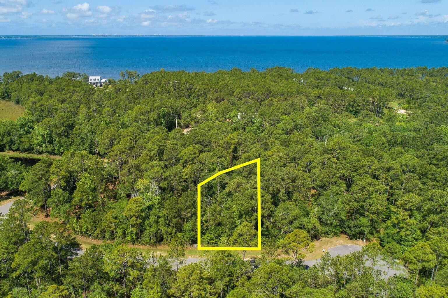 Build your dream home on this private lot on a quite cul-de-sac within walking distance to the Choctawhatchee Bay with in beautiful Bay Harbour!  This community has an abundance of amenities with a very low HOA dues, low taxes and no buildout time requirements.  This professionally landscaped and impeccably maintained bay front neighborhood is the perfect place to build your dream home. Bay Harbour is Freeport's premier upscale lifestyle community. Amenities include walking paths, reflecting ponds, tennis courts, owners' boat & RV storage, community pier, boating, fishing, hiking and picnic pavilion.