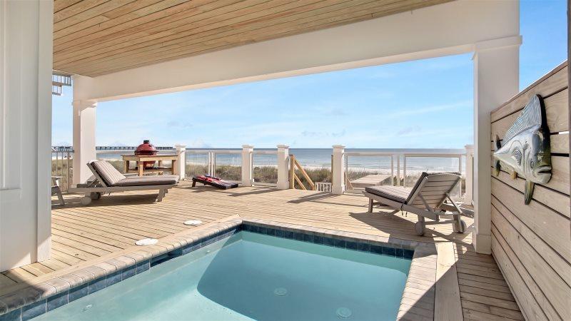 A newly constructed beachfront dream home comes fully furnished and income-producing ready! Home is 3,300 sq.ft. has 6-bedrooms, 6.5-bathrooms, a private pool, a private beachfront boardwalk, and serene ocean views. This 3 story home features 2nd-floor open concept kitchen, dining, and living area. The open concept area features a walkout balcony where you can spend your evenings taking in the most beautiful sunsets you have ever seen. Also located on this floor are two additional bedrooms, one bunk room featuring a queen over queen + twin over twin (sleeps 6) and then a King bedroom. On the beachside of the third floor are two king master bedrooms, each has its own en-suite bathrooms. On the street, the side is another king bedroom as well. Close to Pier Park shopping and dining. Bed Layout:
1st Floor- Sleeps 2 queen sleeper sofa

2nd Floor - Sleeps 8 twin over twin bunk & queen over queen bunk, street view king bedroom, street view.

3rd Floor - Sleeps 8 queen over king bunk, street view,king bedroom, ocean view, king bedroom, ocean view