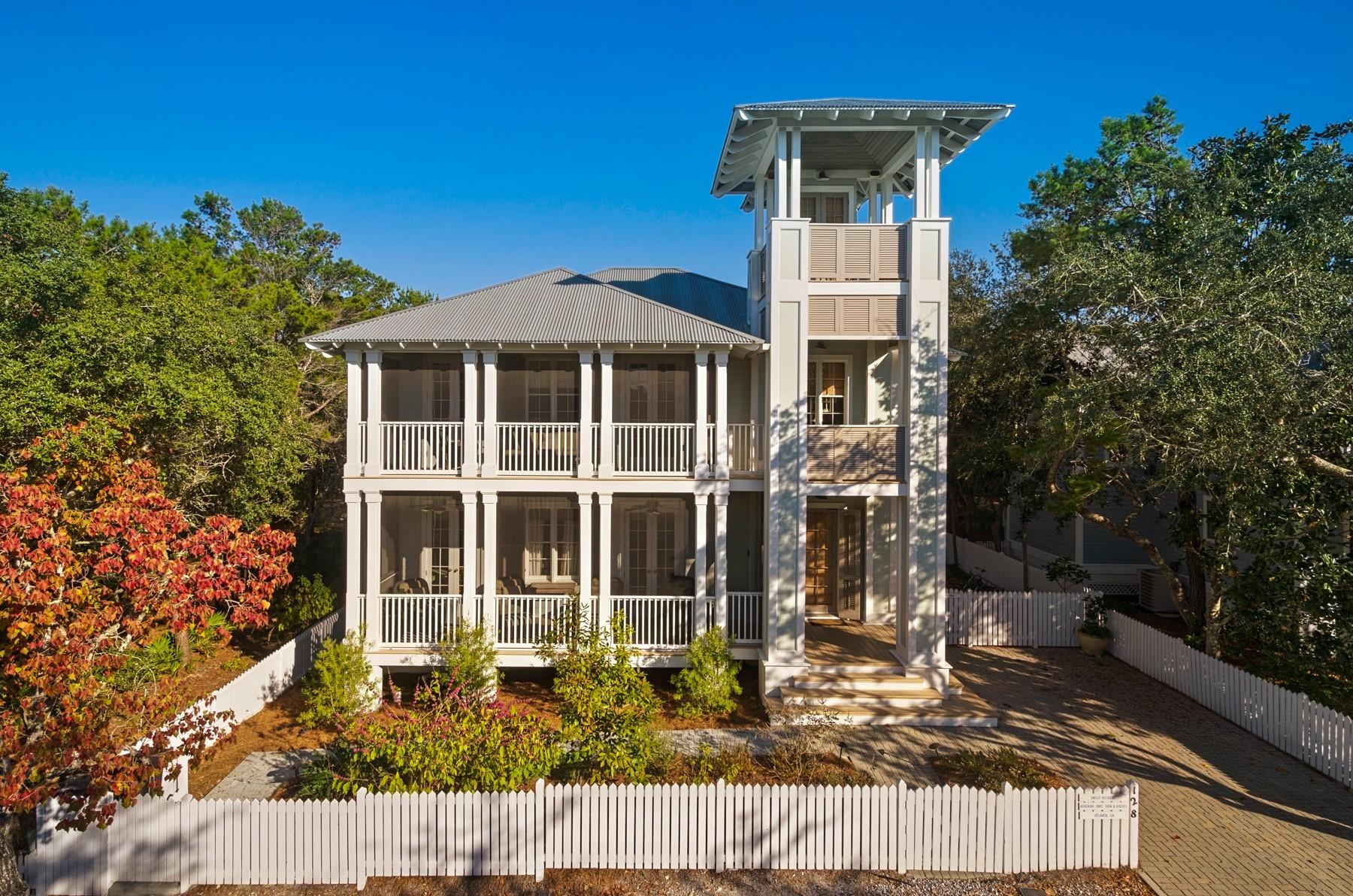 Nestled in the heart of Seaside, this beach home was built to encompass the refined style of one of 30A's original beachside communities.
Upon arriving at Sweet Retreat'' you are welcomed by three stories of outdoor entertaining spaces, along with patios and decking to connect the main house to the fully serviced guest house. Through the generous front foyer, walk into the inviting living and dining room, dressed in a combination of modern and antique furnishings. Doric columns define each of the main areas on the first floor, but offer visibility from every room into the next. The Kitchen is equipped with everything a cook might need and is tucked away with pocket doors to allow entertainment to remain in the large indoor / outdoor living and dining spaces. The second floor offers 3 bedrooms with ensuite bathrooms, and a cozy sitting room with daybed accompanied with a spiral staircase up to the third level porch swing and covered viewing deck.

Built to last in the classic Seaside style with painted all wood interiors, the "Sugar Shack" guest quarters speaks comfort and easy living.  With a fully equipped kitchen and laundry room, this is perfect spot to welcome a 2nd family on your beach vacation.  A full bathroom and day room can function as a bedroom on the first floor, but the true master and half bath is located on the 2nd floor with a stunning Juliet balcony for views of the garden.   

Enjoy the generous outdoor living areas on one of the larger and more private lots backing up to Old Seagrove in iconic Seaside Town. 

Click here to view the virtual tour of this property: https://my.matterport.com/show/?m=zGRfMRGweUq&brand=0

***Buyer is responsible for personally verifying details about this property. All information contained on the listing is believed to be accurate but not guaranteed. ***