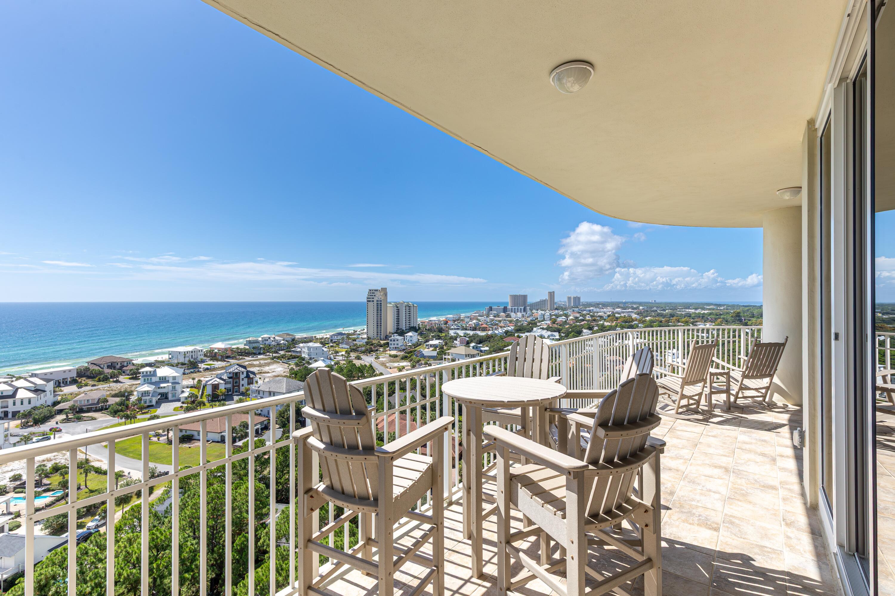 The owner has removed and/or replaced certain items shown in the listing photos. Extremely rare opportunity to own in the preferred west end of the area's most luxurious private residential community. Located in One Beach Club, this residence offers the finest views and amenities available. From every room, enjoy expansive vistas of the gulf, bay, golf course, and marina along with eye-level views of the fireworks over the Bay. Beautifully remodeled, every detail exudes sophistication from the curated lighting and finishes to the luxurious dramatic floor-to-ceiling windows that flood the space with natural light. The chef's kitchen impresses with top-of-the-line Sub-Zero and Wolf appliances, including a Sub-Zero refrigerator and wine cooler and Wolf double ovens.   *All One Beach Club Owners are members to the Exclusive Beach Club*. Wolf induction cooktop, all complemented by a spacious prep island and generous pantry. The primary suite showcases breathtaking Gulf views, private balcony access, dual California closets, and a split-bedroom layout for added privacy. Three additional bedrooms each feature serene Bay views, en-suite baths, and balcony access. Additional highlights include a fully equipped laundry room with custom cabinetry and sink, assigned parking, and thoughtful upgrades throughout. One Beach Club Drive offers unmatched amenities including a gated entrance, garage parking, tennis courts, fitness center, media room, outdoor kitchen, and entertainment lounge. All One Beach Club Owners are members to the Exclusive Beach Club.

As an introduction to the Sandestin lifestyle, we invite our new owners to explore amenities that make Sandestin special. The listing brokerage and seller(s) are presenting the buyer(s) of this property with (2) 90-minute rounds of Tennis court time, a golf foursome at one of our three championship courses, and a round of golf for up to four (4) players at the unrivaled Burnt Pine Golf Club.

Sandestin Golf and Beach Resort features more than seven miles of beaches and pristine bay front, four championship golf courses, 15 world-class tennis courts, a 226-slip marina, a fitness center, spa and celebrity chef dining. Shop, dine and play at the charming pedestrian village, The Village of Baytowne Wharf and more. Inside the gates of the resort, residents enjoy a balanced lifestyle of high-class living, spanning the 2,400 acres from the beach to the bay. Everything within the gates of the resort is accessible by golf cart or bicycle. The entire resort is interconnected by miles of pedestrian, bike and golf cart paths that weave through groves of live oaks, meandering past natural lagoons, fountains, man-made lakes, and meticulously landscaped fairways.