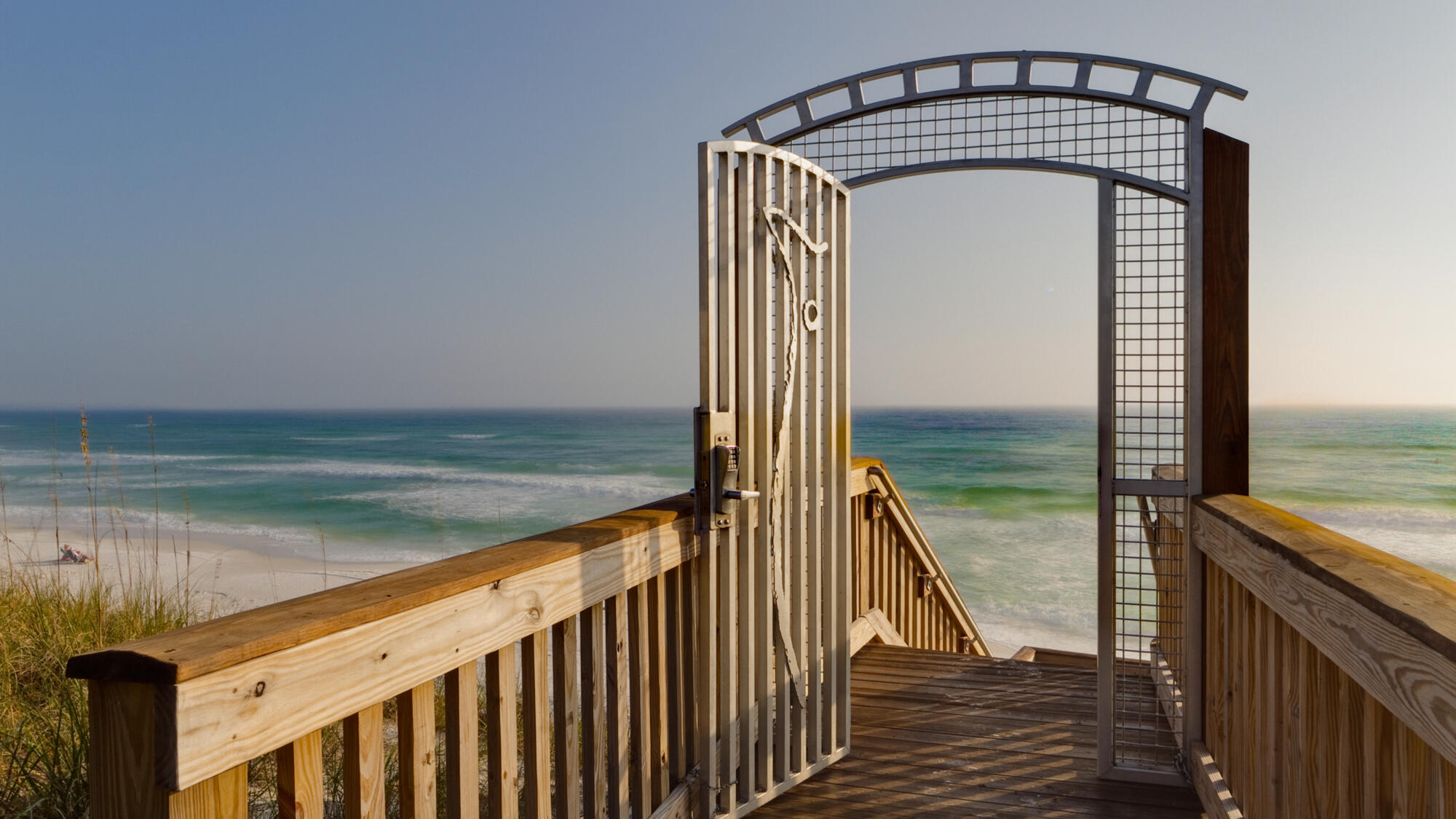 A unique opportunity at Redfish Village, this 4th-floor luxury condo provides gulf views and a westerly orientation for winding down the day over golden sunsets from the condo's oversized corner balcony. Elegant updates include a kitchen and all bathrooms with white quartz counters and vanities, Treme hardwood flooring in mixed acacia and plantation shutters throughout. This spacious 3-bedroom, 3-bathroom coastal getaway comfortably sleeps up to 8 guests. With private laundry area inside the unit for owner convenience. Redfish Village is nestled beside Big Redfish Lake with easy access to beautiful beaches, tasty local spots, and some of the most stunning natural scenery on 30A. Community amenities include a pool, hot tub, exercise room, playground, lakeside boardwalk and beach access. This property comes furnished and decorated for the next owner's comfort and ease. 

Sleeping arrangements include:
Bedroom 1: 1 King bed, TV, deck access, and private bathroom.
Bedroom 2: 2 Queen beds, TV, and private bathroom.
Bedroom 3: 1 Queen bed, TV, and a private bathroom.

All measurements and information are deemed reliable but should be verified by buyer.
