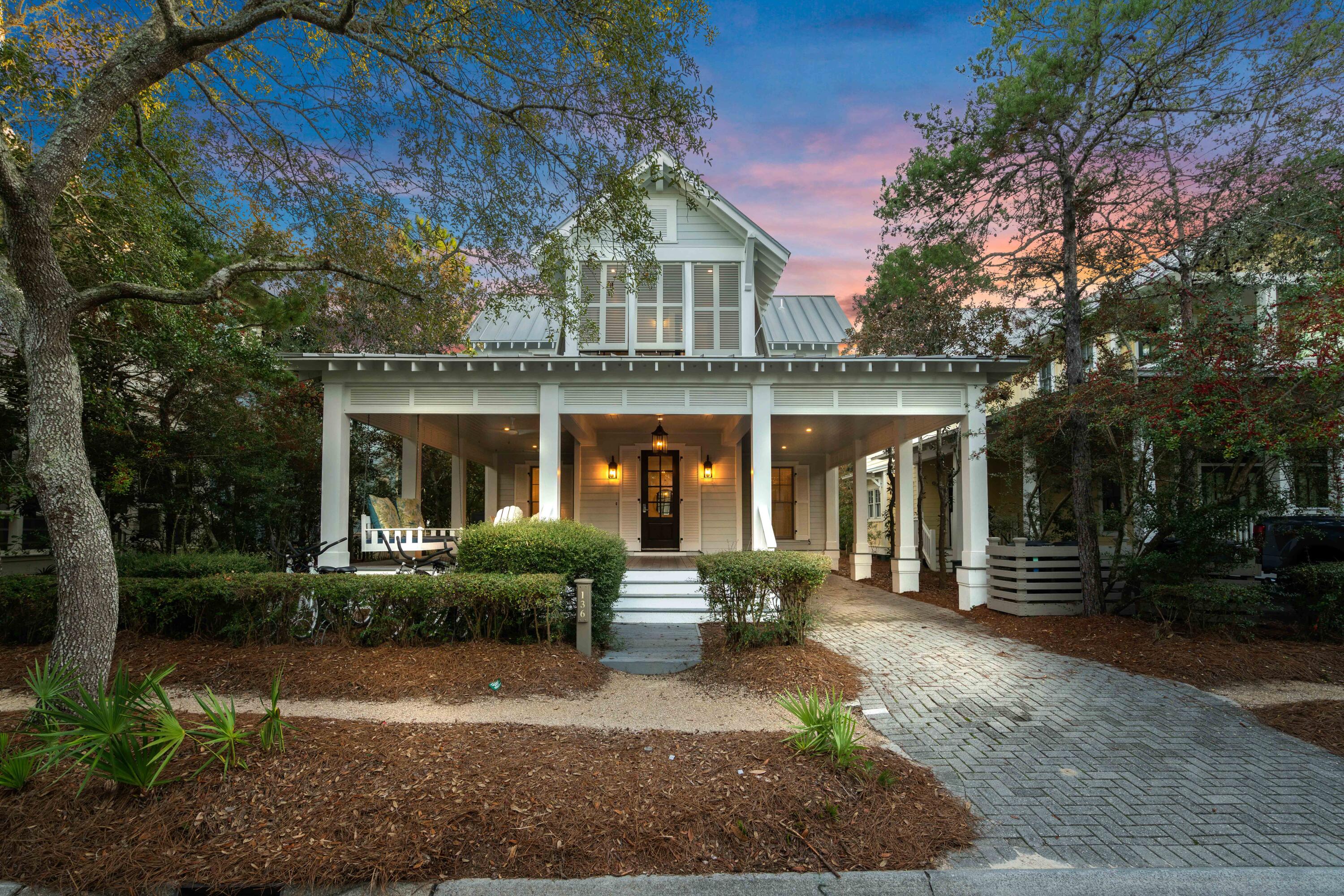 Phase 1 Remodel - A Coastal Retreat Steps from 30A and the WaterColor Beach Club

Welcome to 136 Silver Laurel, an elegantly remodeled cottage ideally located in the heart of WaterColor. Just two blocks from the stunning Gulf-front WaterColor Beach Club and within walking distance to the vibrant towns of WaterColor and Seaside, this home combines charm with unmatched convenience.

With a design that encourages relaxation and togetherness, the open-concept layout is perfect for entertaining family and friends. The gourmet kitchen on the second floor features granite countertops, stainless steel appliances, and a breakfast bar that seamlessly connects to the inviting living and dining areas.  The luxurious primary suite is also located on this level, offering a plush king-sized bedideal for unwinding after a day in WaterColor's coastal paradise.

Relax on the covered porch and soak in the Florida coastal charm, or take a bike ride to Seaside for shopping, dining, and entertainment.

Home Highlights:

Located in WaterColor's highly sought-after Park District
Only 2 blocks from the WaterColor Beach Club
Fully equipped gourmet kitchen
Spacious covered porch for outdoor enjoyment
Two dedicated parking spaces
Walkable to the beach, shopping, dining, and entertainment
WaterColor Community Highlights:

Voted the #1 Family Vacation Destination in the U.S.
Expansive 499-acre coastal resort and residential community
Bike-friendly streets and scenic trails
Award-winning tennis facilities
Dining options near the beach, pool, and lakeside
Close proximity to state parks and nature preserves
Four community swimming pools
Home Configuration & Sleeping Arrangements:

Sleeps 12 | 5 Bedrooms | 3.5 Baths

First Floor:

Guest Bedroom 1: King Bed, Private Bath (Shower/Tub Combo), Deck & Patio, Smart TV
Guest Bedroom 2: Queen Bed, Shared Bath (Shower), Deck & Patio, Smart TV
Guest Bedroom 3: Queen Bed, Shared Bath (Shower), Smart TV
Guest Bedroom 4: Bunk Room with Two Twin/Twin Bunks, Shared Bath (Shower), Smart TV
Second Floor:

Primary Suite: King Bed, Private Bath (Shower & Soaking Tub), Balcony, Smart TV
This home provides the perfect mix of modern upgrades and coastal charm for your next WaterColor getaway!