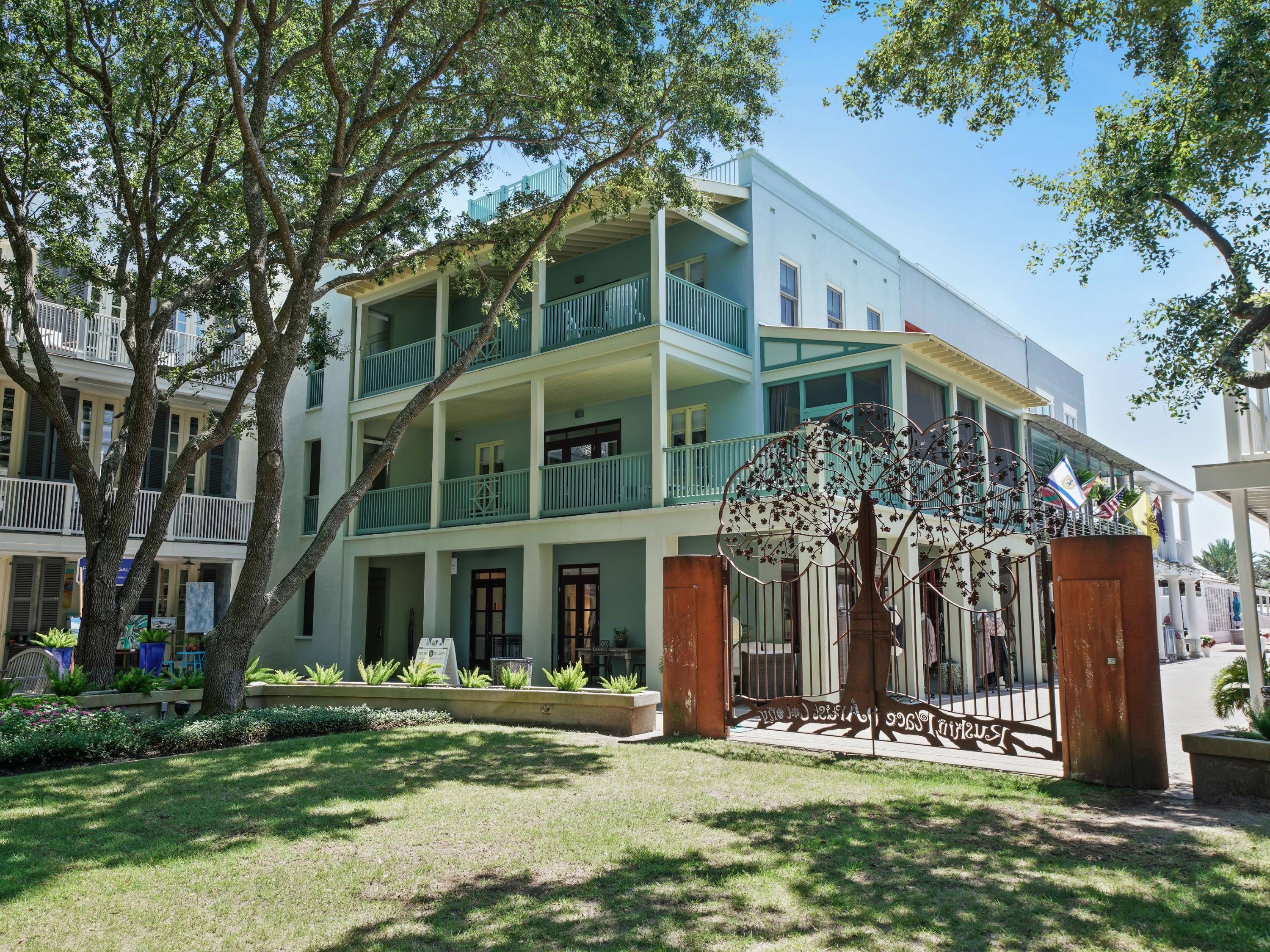 Commercial/residential building located at the edge of Ruskin Park in Seaside. The building has 4 streams of revenue, which include (a) first-floor commercial space, plus a (b) 1 bedroom unit; (c) second floor 3 bedroom unit ; (d) 3rd floor 2 bedroom unit and fabulous rooftop with outdoor living space. Property is a great opportunity to be able to live in one unit and rent the remaining units for income. The building is all concrete with clean sleek lines and has THREE separate apartments, each with their own kitchen, appliances and established income revenue. There is also an interior staircase that can be used to lockout or access all units in the property. You could be living in a little city at the beach, and also enjoy a great income.  Located just a few hundred yards from the Gulf of Mexico, the unit allows guests to enjoy the boutiques, restaurants, and all of the amenities that Seaside offers. The Ruskin Park, and the Seaside Chapel are just a few steps away.