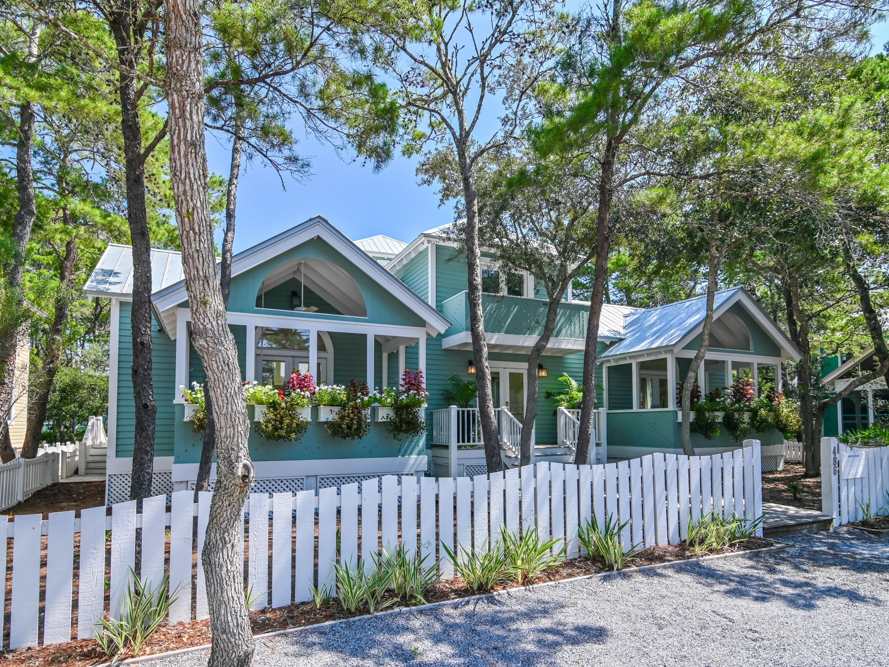 Seaside Perfection - Fully Refreshed Coastal Cottage Just Steps from the Town Square Now Offered Newly Furnished. 

This beautifully reimagined 3-bedroom, 3.5-bath home in the heart of Seaside offers 2,294 square feet of light-filled living space and timeless architectural appeal by Scott Merrill. Recently refreshed inside and out, the home blends classic charm with modern comfort, featuring soaring ceilings, white oak floors, custom millwork, and designer lighting throughout.

The open-concept living and dining area flows seamlessly into a bright, fully updated kitchen, while each spacious bedroom includes an en suite bath for privacy and ease. A new optional bunk room adds flexibility for guests or family. Multiple covered porches and a private courtyard extend the living experience outdoors, perfect for additional dining or even a creative additioin of a pool.

The cottage is a 1 bedroom 1 and 1/2 bath cottage with a first floor TV room and a second level Bath and Kitchenette and that third level bedroom nicely appointed.   Get in Touch.