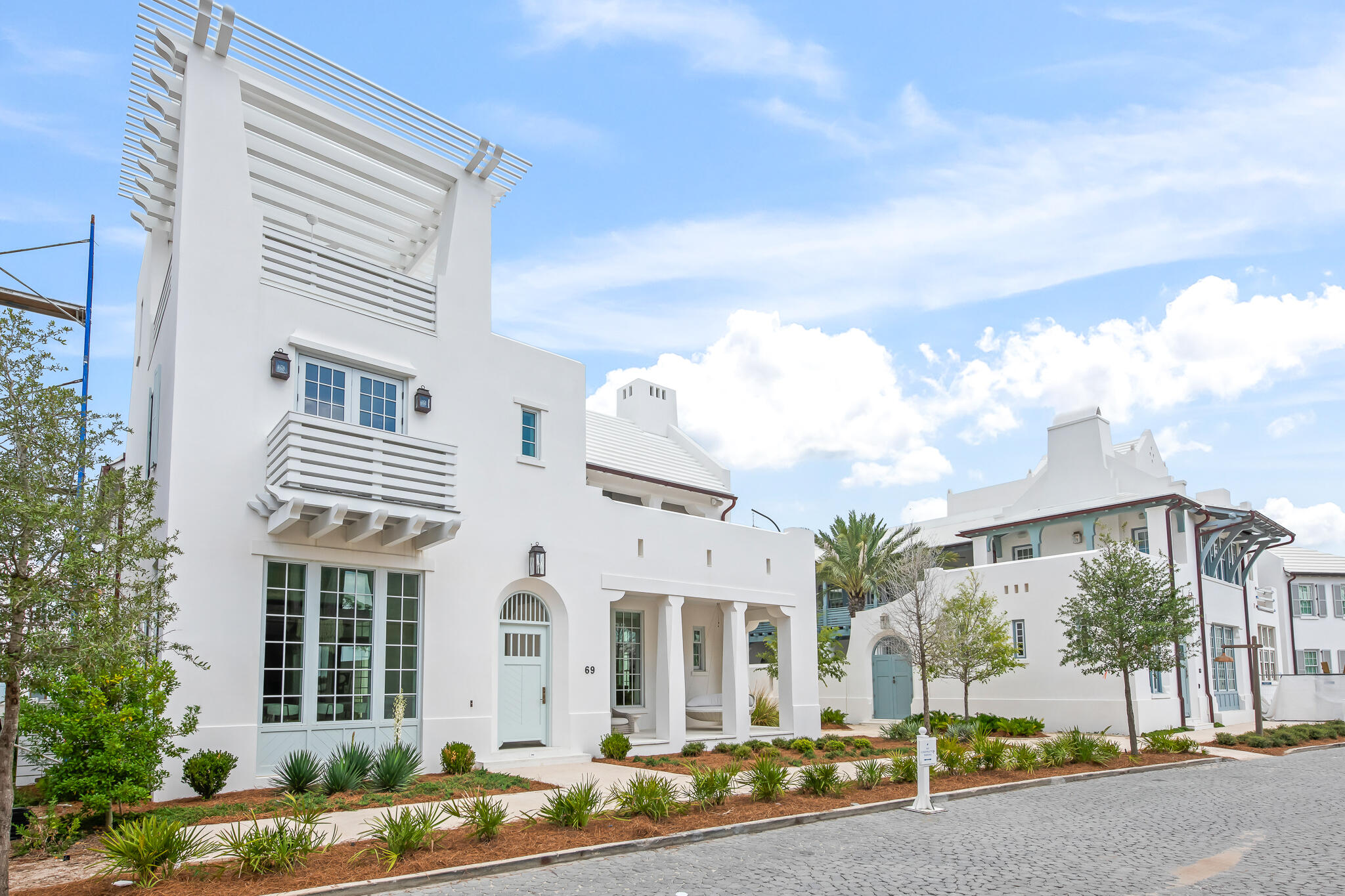 This stunning custom freestanding Alys Beach home recently completed on 69 Plumbago Lane and designed by Jason R. Dunham offers a spacious and thoughtfully designed layout. Amongst the 4,169 conditioned square feet, the house features Two Master Suites, Two Guest Bedroom Suites and two half baths and combines multiple indoor and outdoor living spaces.A large covered second floor outdoor living area equipped with a wet bar, summer kitchen, and fireplace looks west towards sunsets and the nature preserve. A versatile tower room spills out to a third-floor rooftop terrace that provides the iconic mediterranean rooftop views that Alys Beach is known for.A generously sized first-floor living room looks out to the private courtyard and pool and seamlessly connects the kitchen and dining areas. A large master suite on the first floor provides convenient single-level living. A two-car garage provides ample storage.On the second floor, you'll find another master suite along with two additional guest suites. This level also features a large indoor living room, great for entertaining or relaxing.Upgraded finishes, appliances and audio/visual are found throughout the home. Professional interior furnishings convey with the sale of this home.