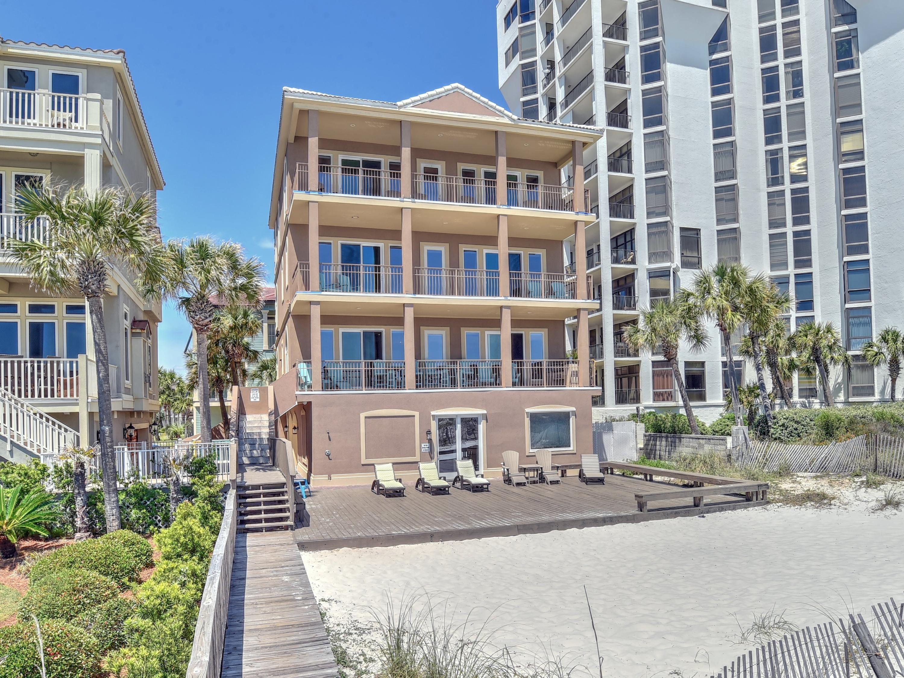 Do Yourself a Favor and Look at all of the New Pictures as of 5-3-18. This home is simply Awesome!!! 2017 Base Booking Fees were $244,135. This is one of the most beautifully remodeled beach homes in one of the best gated communities in the heart of Destin with low Homeowner Association Fees. This home features 10x40 foot balconies on the 2nd, 3rd, and 4th floors. On the 2nd floor which features the Kitchen and Great Room areas which are professional designed to be completely open so that the views of the beach are everywhere you sit makes your stay at the beach totally relaxing. The entire home has been remodeled, and the new kitchen features 2 refrigerators and 2 dishwashers, granite counter tops, tile and wood flooring, instant hot water with Rinnai Water Heaters. individual bathrooms in each bedroom with two of the bedrooms also being ocean front, along with another 10x40 foot balcony that all upper floor bedrooms can enjoy for morning coffee.  Lay in one of your 4 ocean front bedrooms at night and listen to the gentle waves of the Gulf of Mexico and then wake up in the morning to the most beautiful view in the world.  Stroll down the beautiful spiral staircase to the 2nd floor and enjoy a breakfast where the views of the beach are spectacular to say the least.  You have to come and see the layout of this home to truly appreciate it so why not come and take a look today.  On the ground floor level there is what I call the Kids Camp, which sleeps at least 12 people all by itself, and has it's own private Bedroom for adults or older children.  The Kids Camp also comes complete with a pool table, multiple TV's, two bathrooms complete with two showers in each bathroom, it's own laundry room in the huge oversized garage.  The Kids Camp leads directly out to a huge wooden patio that leads right to the beach.  There is also a two car garage on the ground floor with plenty of room for storage and parking.  You will love the awesome open floor plan from the moment you walk into this home.  It is simply spectacular.  Just check out the pictures.  Click on the main picture and then click on the slideshow to view additional pictures of this fabulous home.  If you have ever been in Destin then you know that we have the most beautiful beaches in the world and now you can have the most beautiful beach home in Destin.  There is an ELEVATOR for your convenience that goes from the ground level all the way up to the 4th floor.  Please take a look at this home today as there is nothing like this on the beach for this price.  You have plenty of room to put a pool in the back yard or off of your 2nd level deck.  You could enlarge your balcony on the 2nd floor to match your neighbors and put in an Infinity Pool and as you relaxed at your home after a day on the beach you would have the best of all worlds complete with view and total relaxation.  Paradise is just waiting for your arrival.  Call me or your Realtor today to take a look at this fabulous beach home.