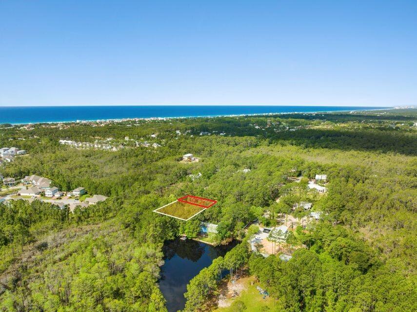 Lot 20 is roughly 1/3 acre and just a short walking or biking distance to beach access at Ed Walline Park on the Gulf. Lot is mostly cleared, level, and on a quiet private road. Lots are in the X Flood zone and NO flood insurance is required.  There is also NO HOA dues here.